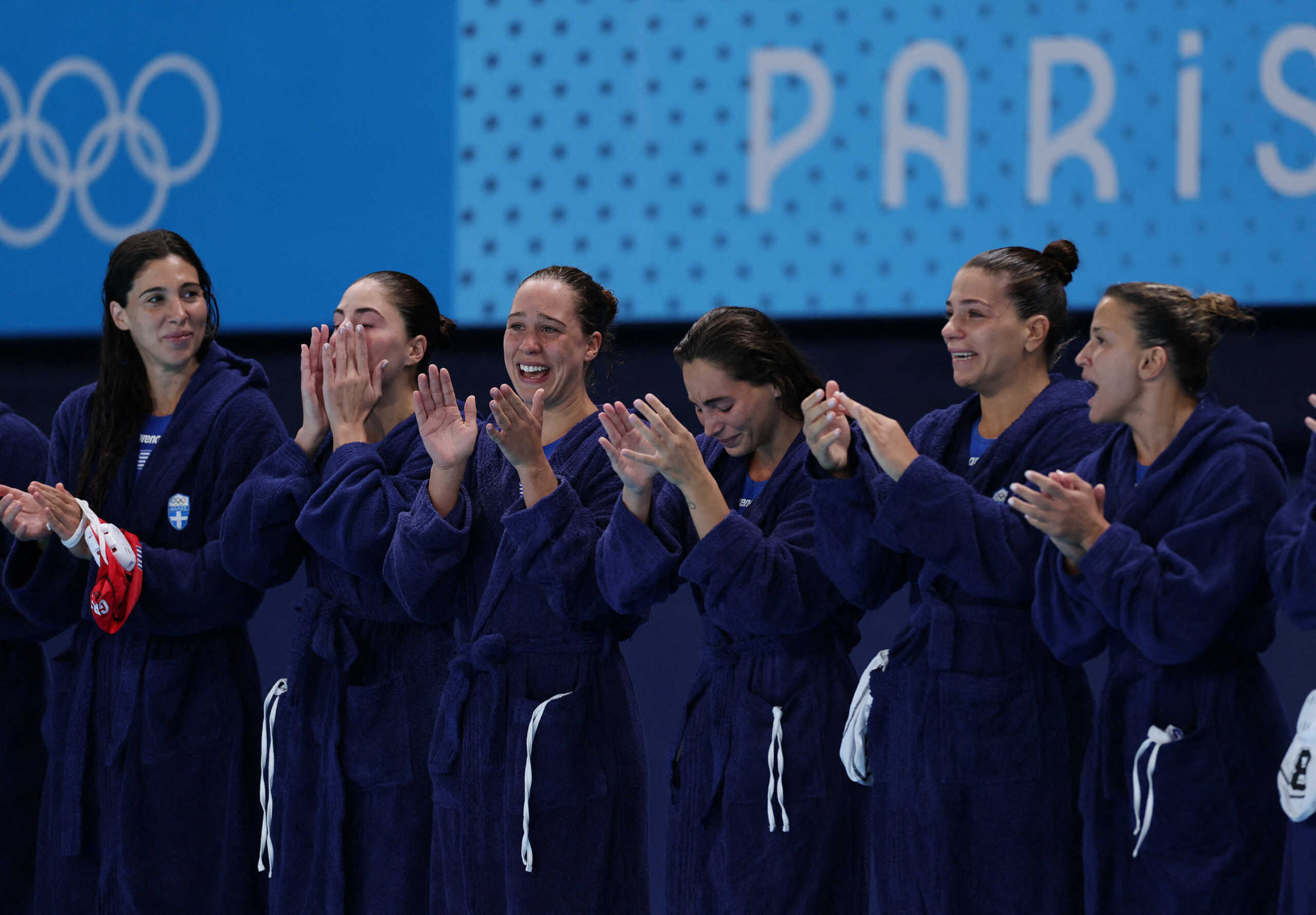 Paris 2024 Olympics - Water Polo - Women's Preliminary Round - Group B - Greece vs United States of America - Aquatics Centre, Saint-Denis, France - July 27, 2024. Athletes of Greece stand together before the game REUTERS