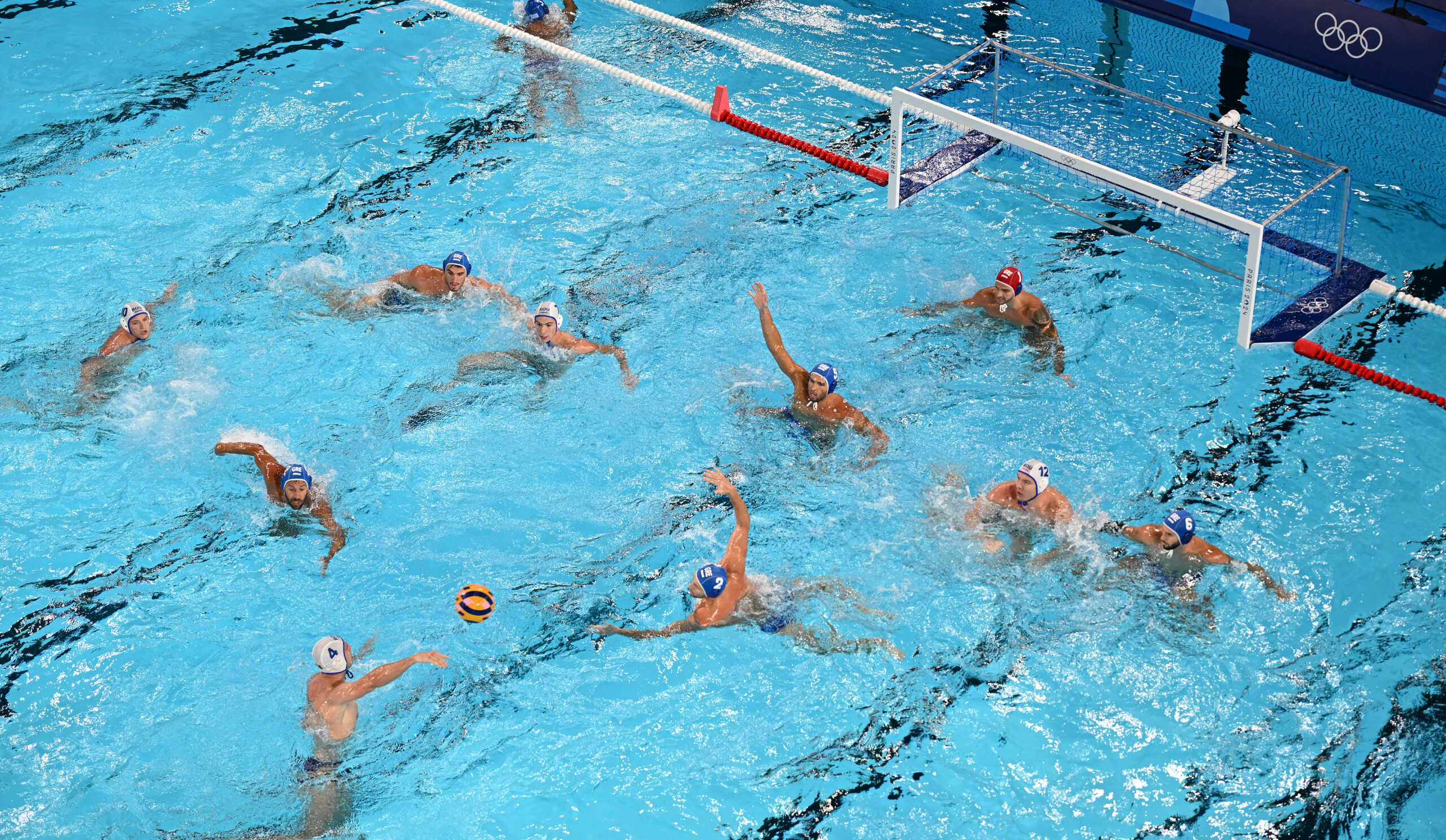 Paris 2024 Olympics - Water Polo - Men's Preliminary Round - Group A - Romania vs Greece - Aquatics Centre, Saint-Denis, France - July 28, 2024. General view of athletes in action. REUTERS