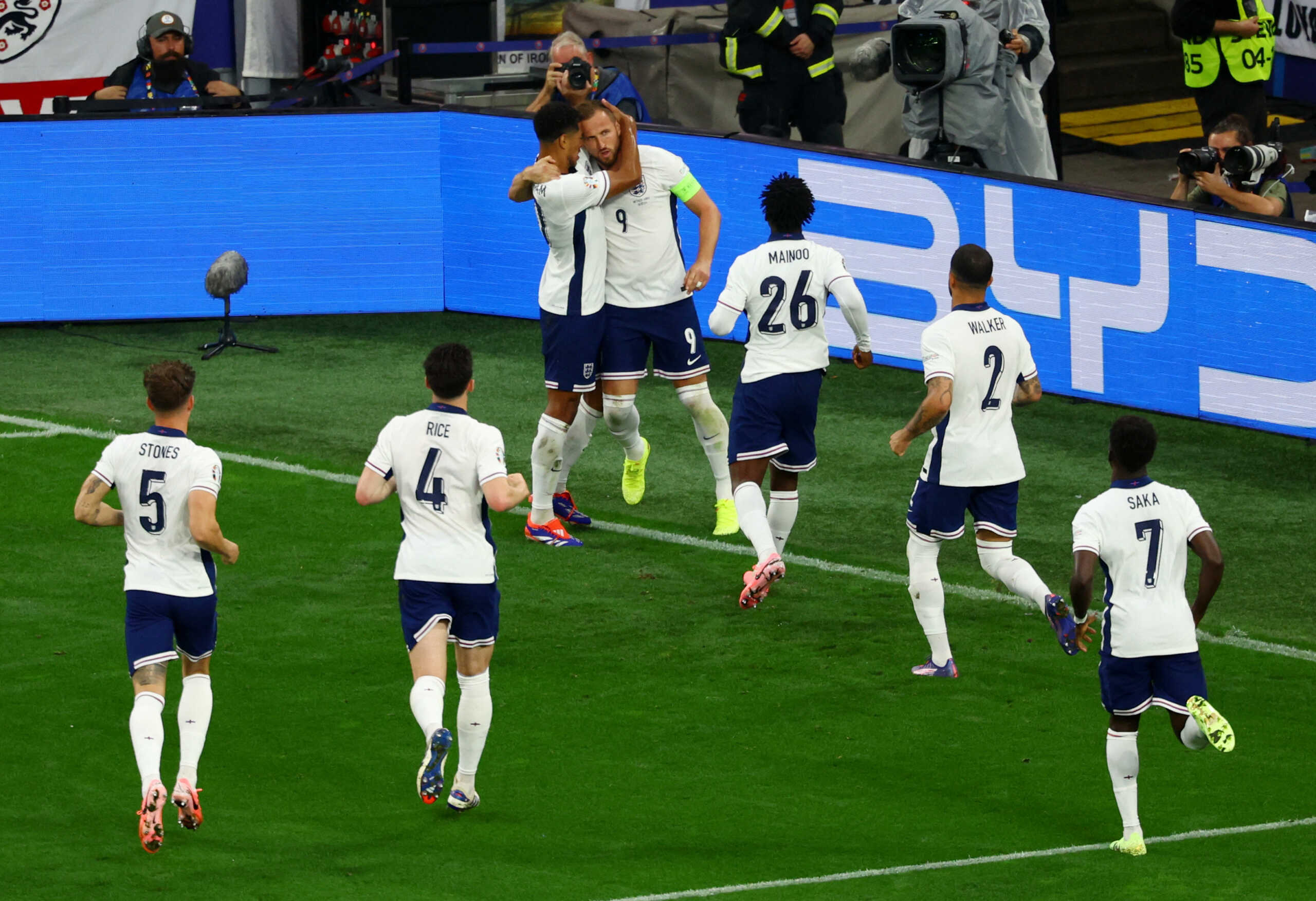 Soccer Football - Euro 2024 - Semi Final - Netherlands v England - Dortmund BVB Stadion, Dortmund, Germany - July 10, 2024  England's Harry Kane celebrates scoring their first goal with Jude Bellingham REUTERS