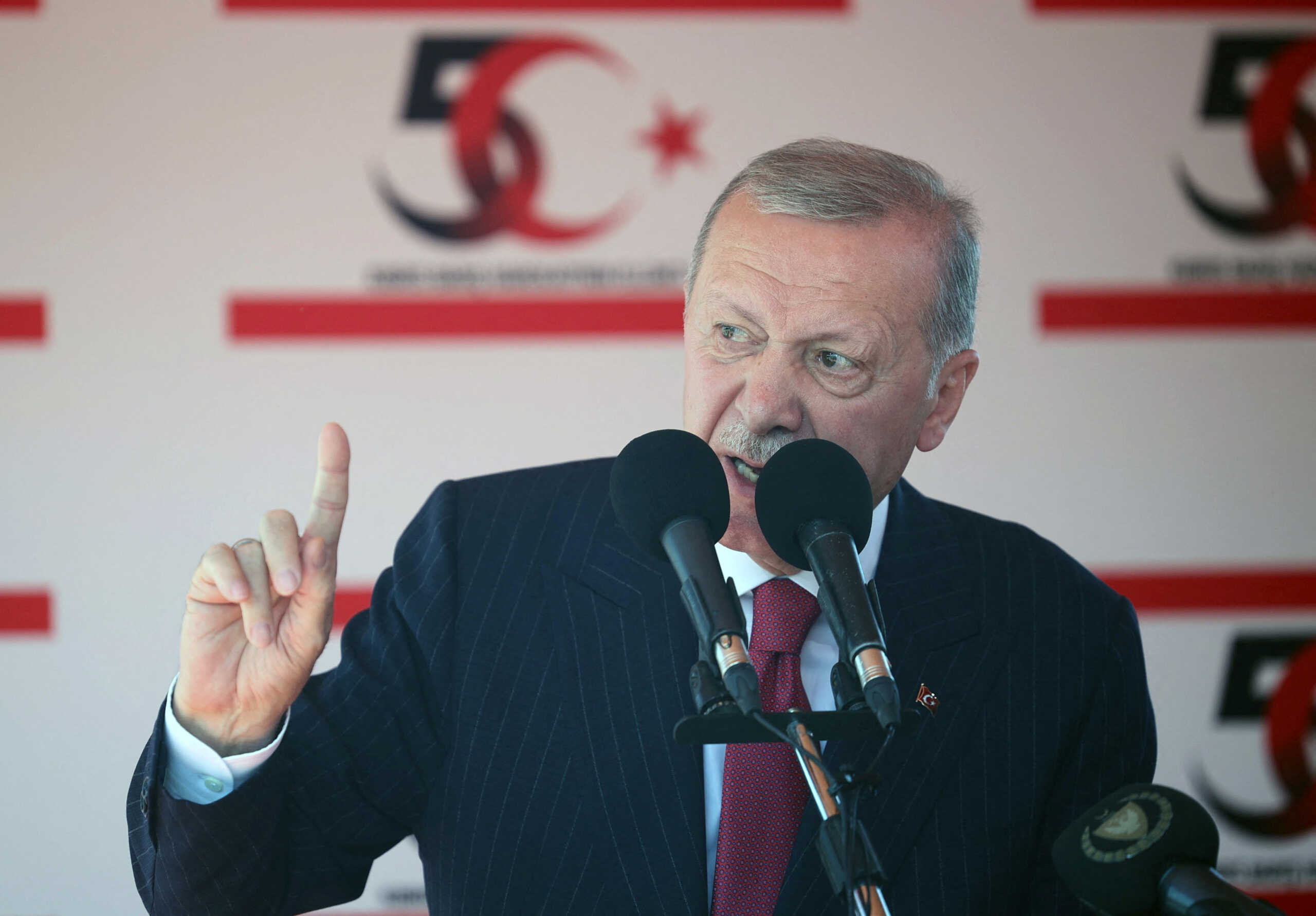 Turkish President Tayyip Erdogan attends a military parade to mark the 1974 Turkish invasion of Cyprus in response to a short-lived Greek-inspired coup, in the Turkish-controlled northern Cyprus, in the divided city of Nicosia, Cyprus July 20, 2024. REUTERS