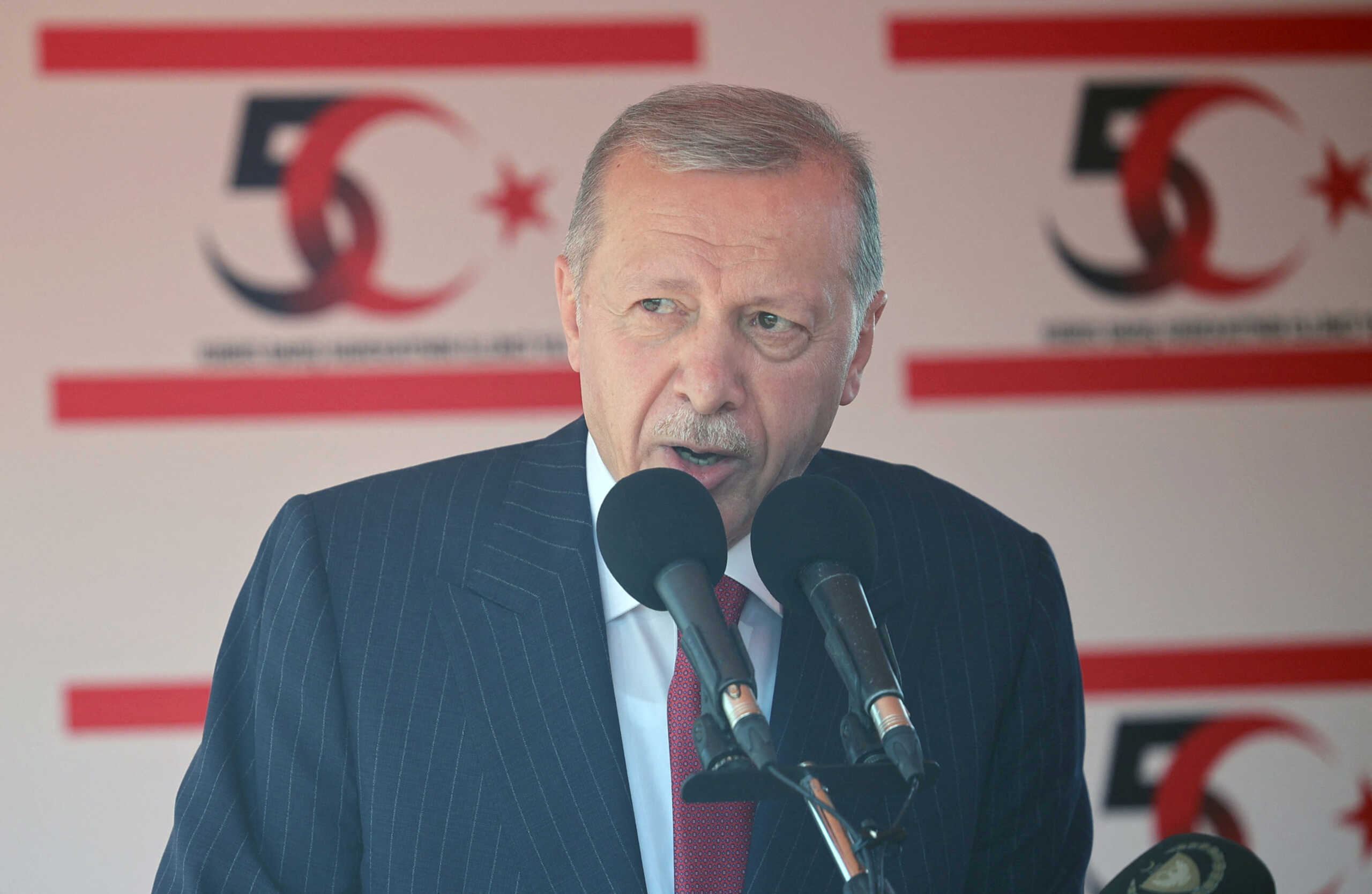 Turkish President Tayyip Erdogan attends a military parade to mark the 1974 Turkish invasion of Cyprus in response to a short-lived Greek-inspired coup, in the Turkish-controlled northern Cyprus, in the divided city of Nicosia, Cyprus July 20, 2024. REUTERS