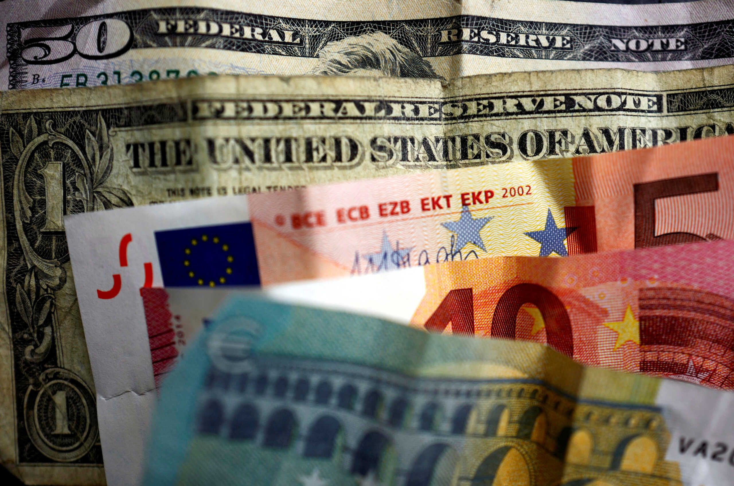 FILE PHOTO: U.S. dollar and Euro bank notes are photographed in Frankfurt, Germany, in this illustration picture taken May 7, 2017. REUTERS