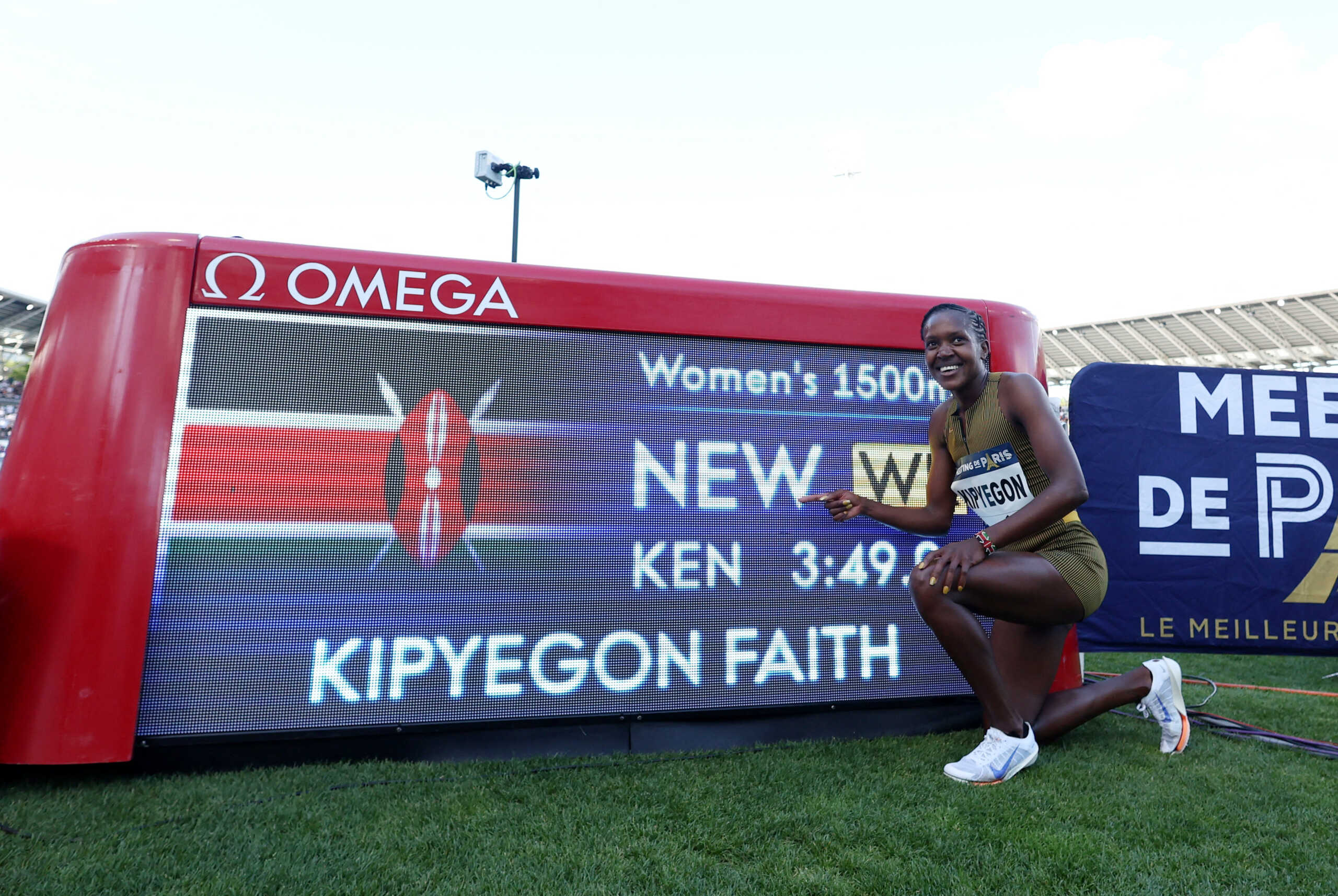 Athletics - Diamond League - Paris -  Stade Charlety, Paris, France - July 7, 2024 Kenya's Faith Kipyegon poses after setting a new national record in the women's 1500m REUTERS