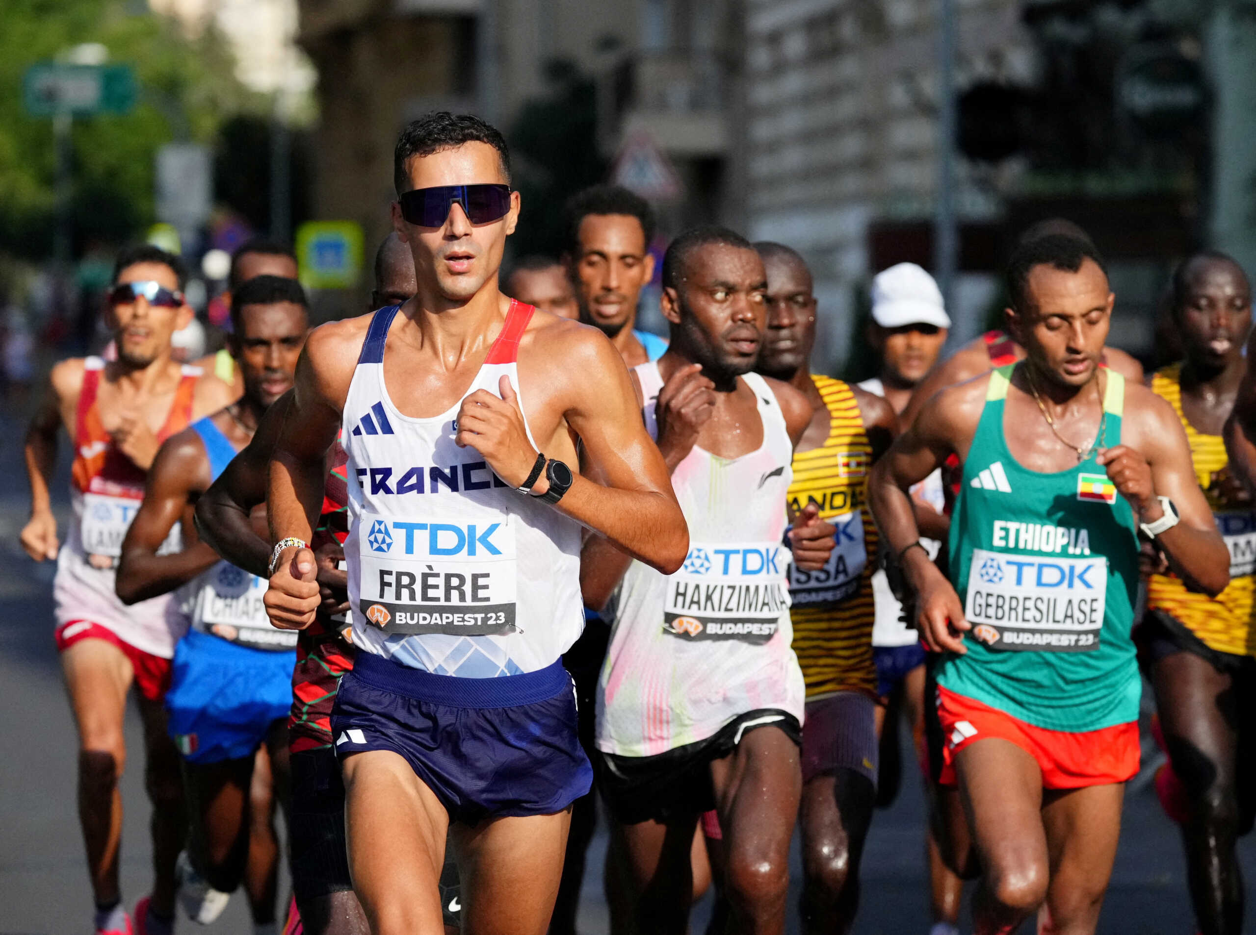 FILE PHOTO: Athletics - World Athletics Championship - Men's Marathon - Budapest, Hungary - August 27, 2023 France's Mehdi Frere, Rwanda's John Hakizimana and athletes in action during the men's marathon final REUTERS