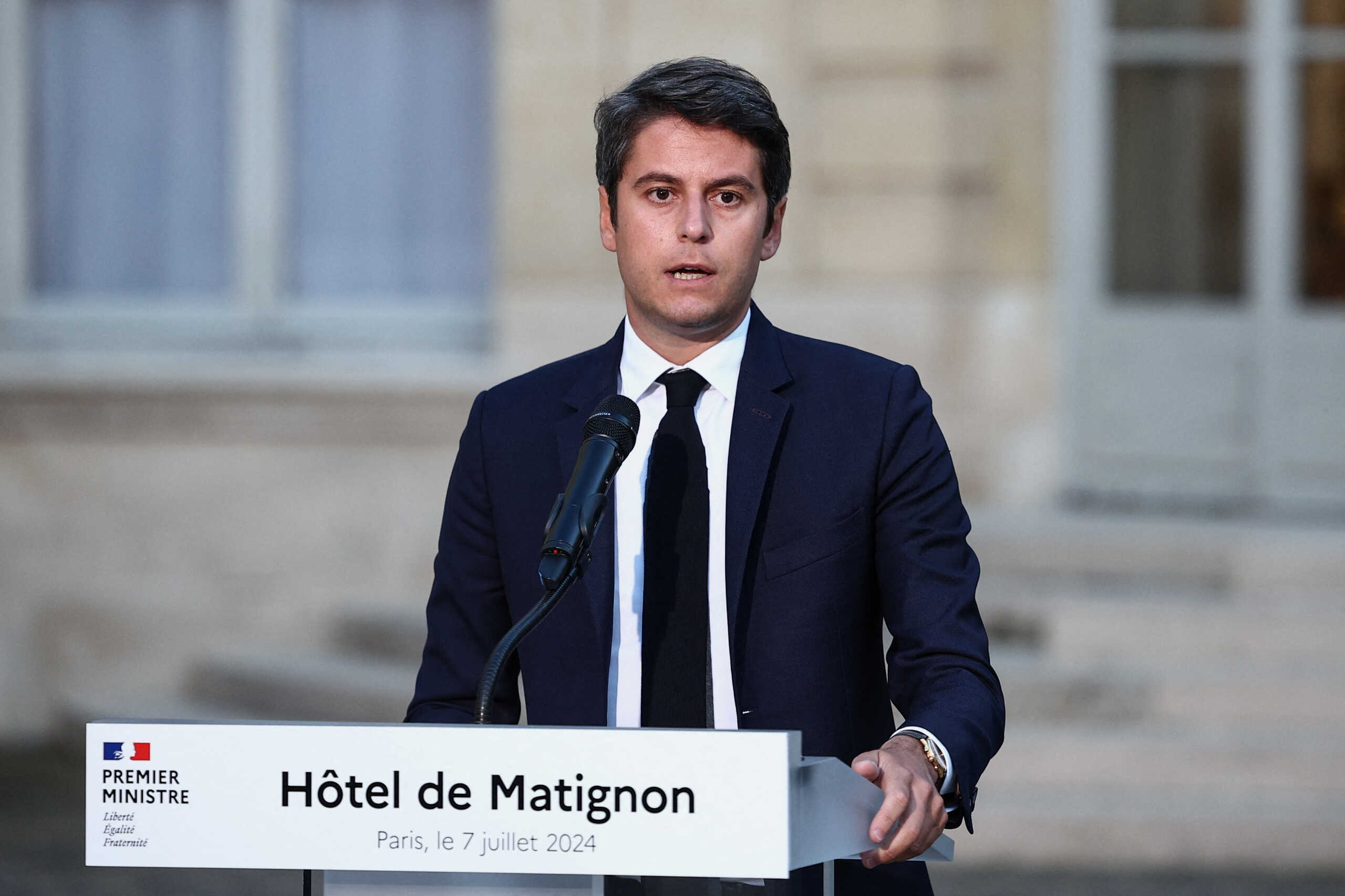 Gabriel Attal, French Prime Minister and French presidential majority group "Ensemble pour la Republique" candidate, delivers a speech after partial results in the second round of the early French parliamentary elections, at Hotel Matignon in Paris in Paris, France, July 7, 2024. REUTERS