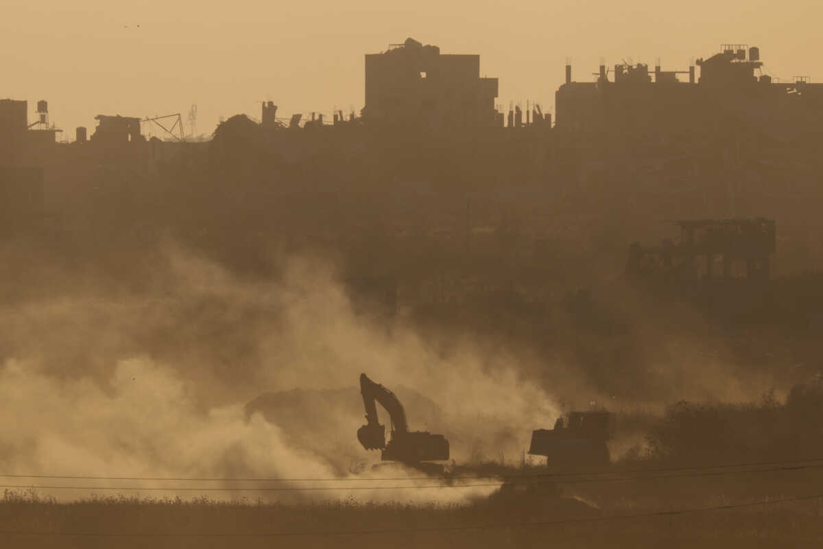 An excavator operates inside Gaza near the Israel-Gaza border, amid the Israel-Hamas conflict, in Israel, July 3, 2024. REUTERS