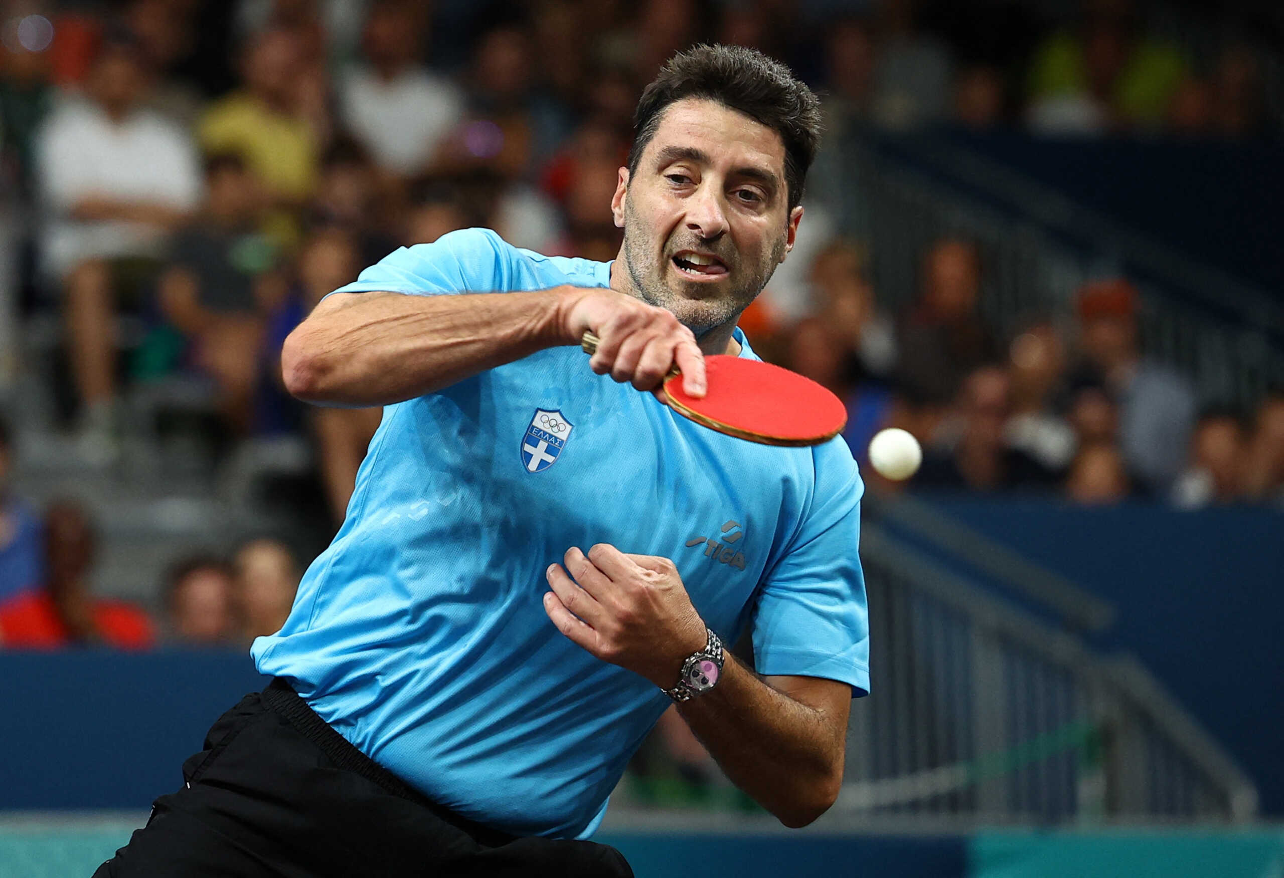 Paris 2024 Olympics - Table Tennis - Men's Singles Round of 64 - South Paris Arena 4, Paris, France - July 28, 2024. Panagiotis Gionis of Greece in action during his round of 64 match against Edward Ly of Canada. REUTERS