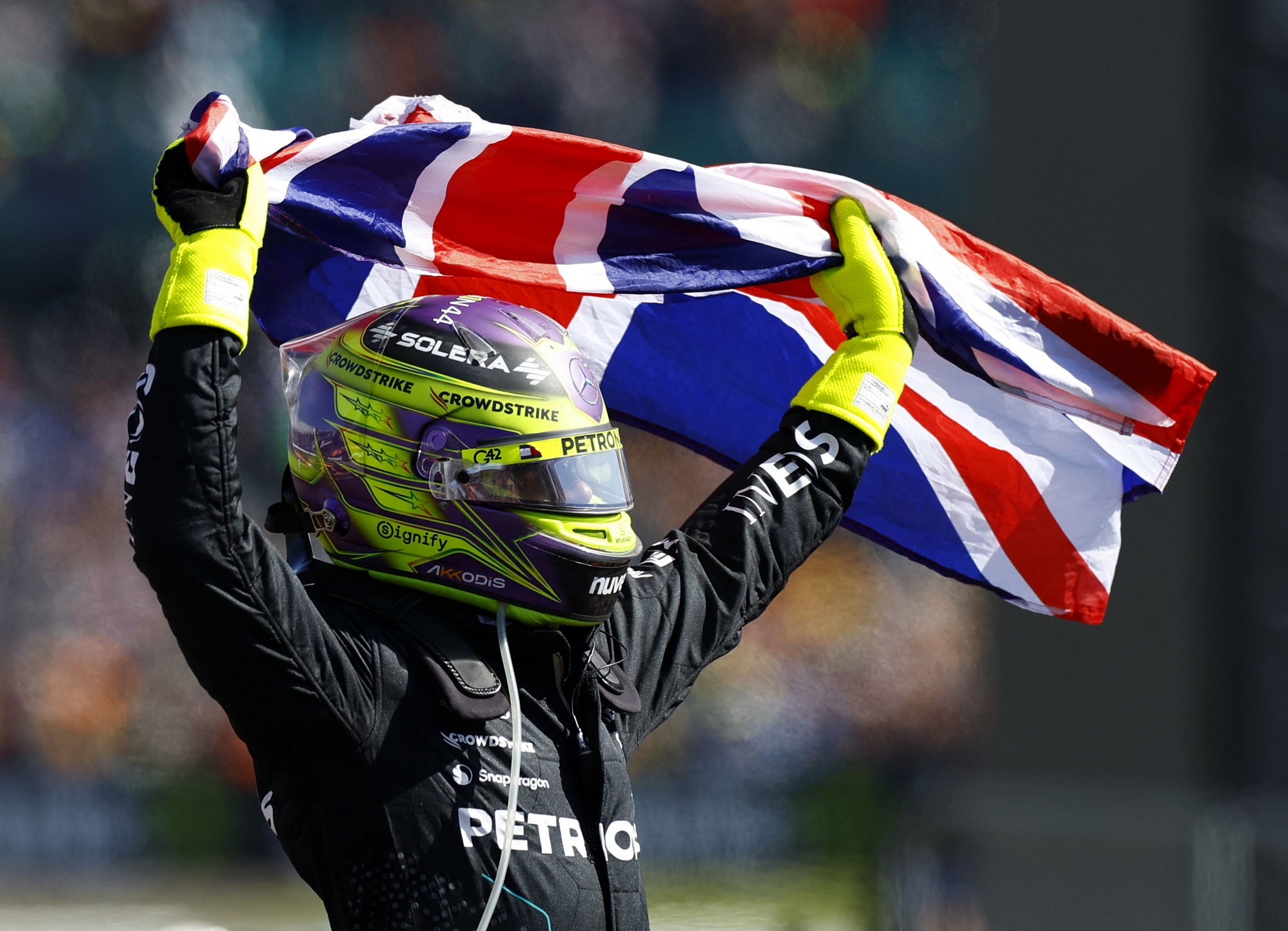 Formula One F1 - British Grand Prix - Silverstone Circuit, Silverstone, Britain - July 7, 2024 Mercedes' Lewis Hamilton celebrates after winning the British Grand Prix REUTERS