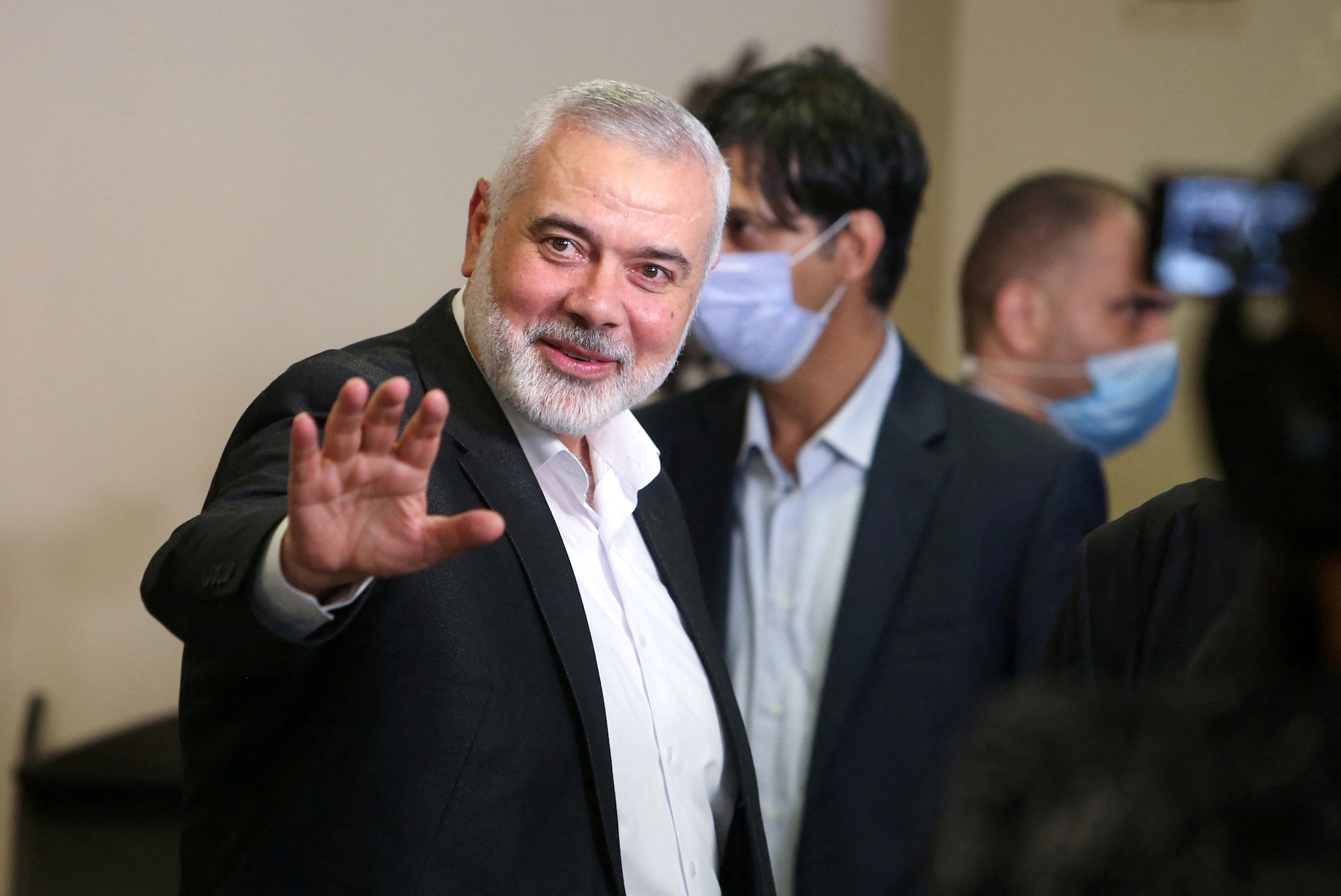 FILE PHOTO: Hamas Chief Ismail Haniyeh waves as he attends the Palestinian factions' meeting over Israel and the United Arab Emirates' deal to normalise ties, in Beirut, Lebanon September 3, 2020. REUTERS
