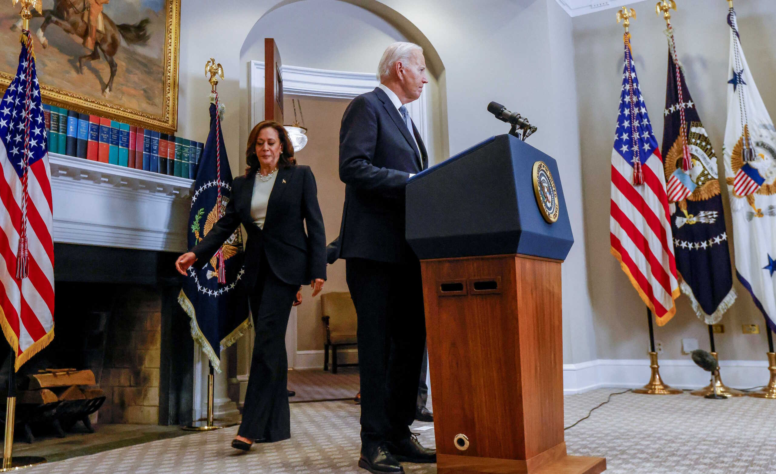U.S. President Joe Biden arrives with Vice President Kamala Harris ahead of a statement a day after Republican challenger Donald Trump was shot at a campaign rally, during brief remarks at the White House in Washington, U.S., July 14, 2024. REUTERS