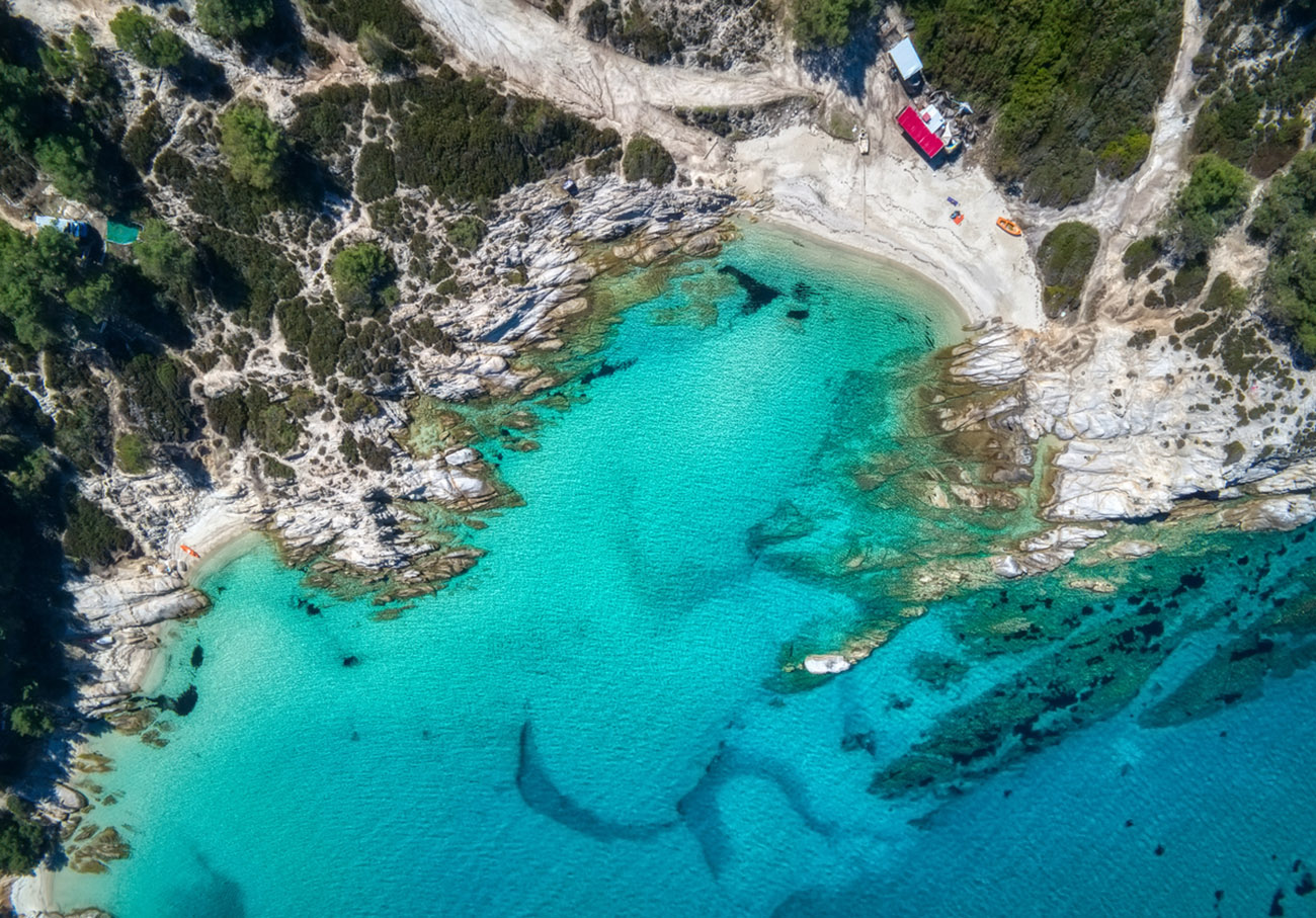 Kavourotrypes or Orange is a small paradise of small beaches located between Armenistis and Platanitsi in Sithonia, Chalkidiki, Greece