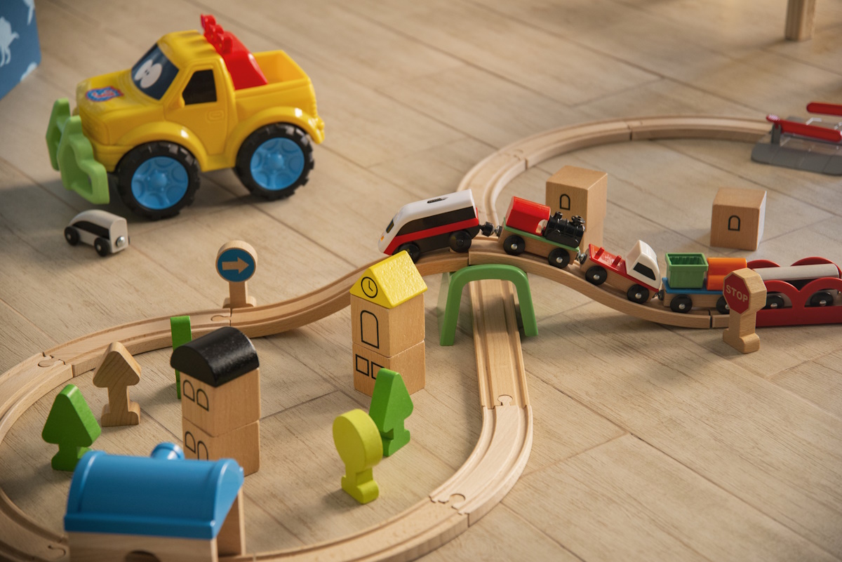 Wooden toy train on track. High quality photo
