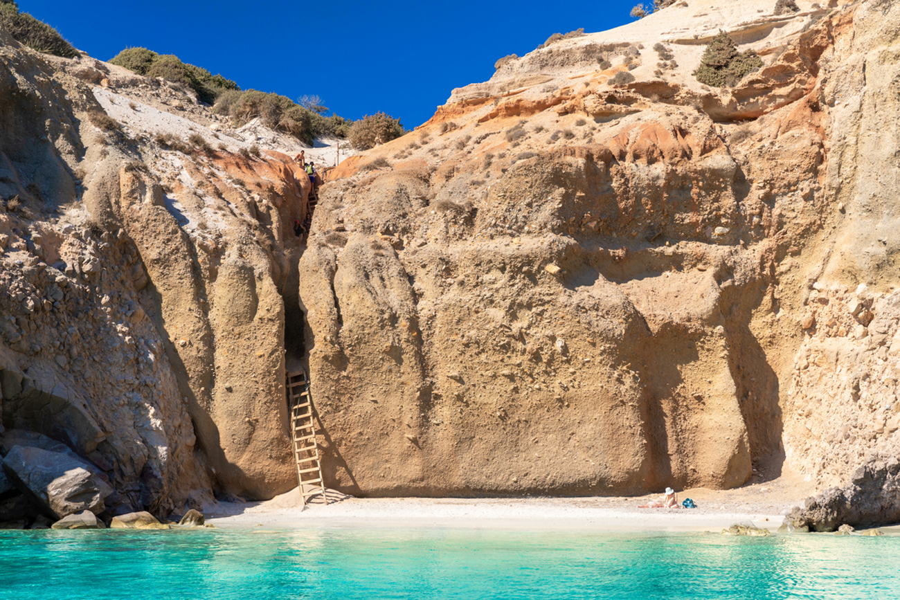 The famous Tsigrado beach with crystal clear waters and rocks. Great place for snorkeling. Milos island, Greece. High quality photo