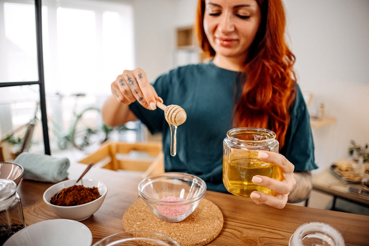 Woman prepares a natural skin care product at home