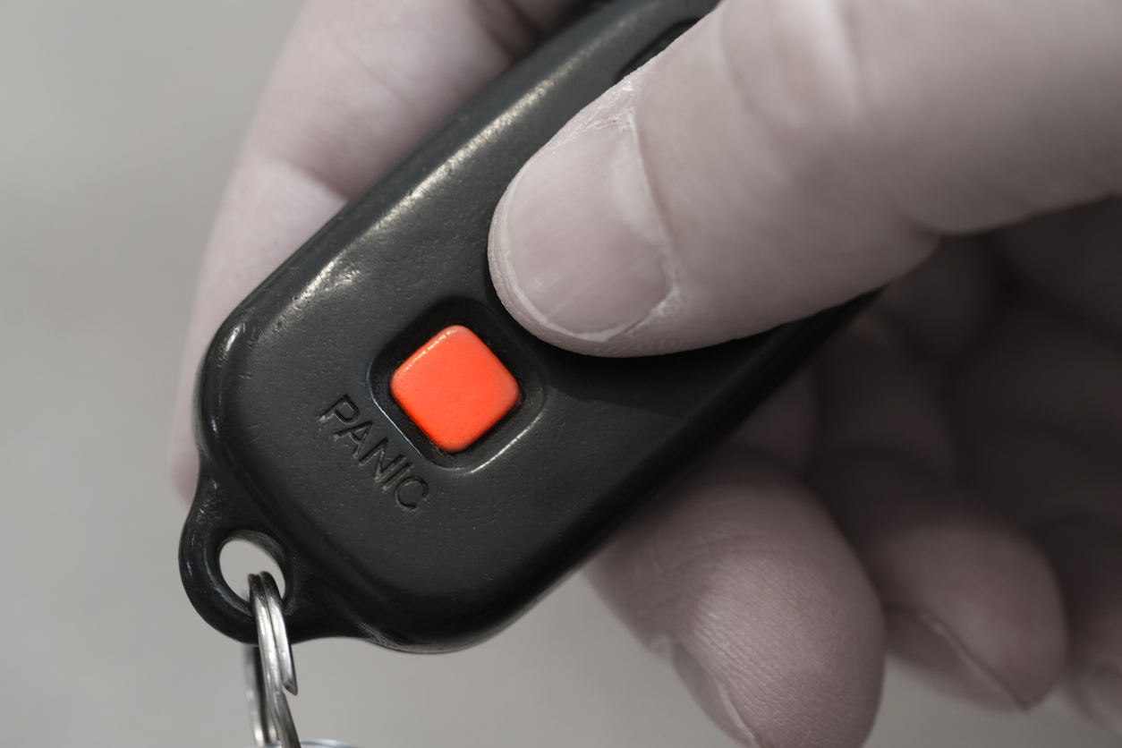 Closeup of Panic Button on key fob for car safety system on keys