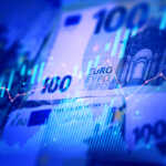 Euro banknotes with stock market chart graph for currency exchange and global trade forex concept