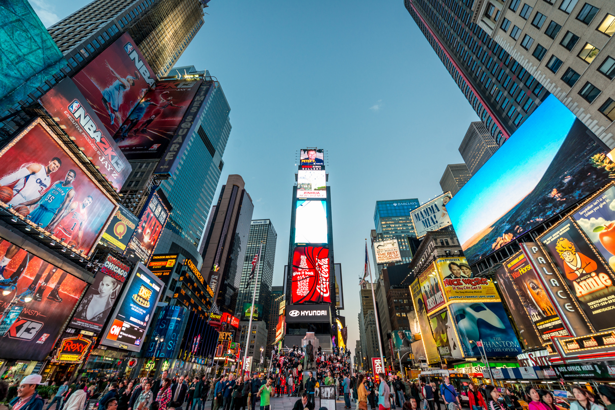 Crowded Times Square at Twilight in New York City, USA.