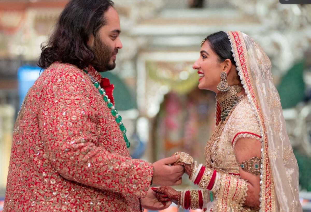 Anant Ambani, son of Indian billionaire Mukesh Ambani, and Radhika Merchant, daughter of industrialist Viren Merchant, react during their wedding celebrations in Mumbai, India, July 12, 2024. Reliance Industries