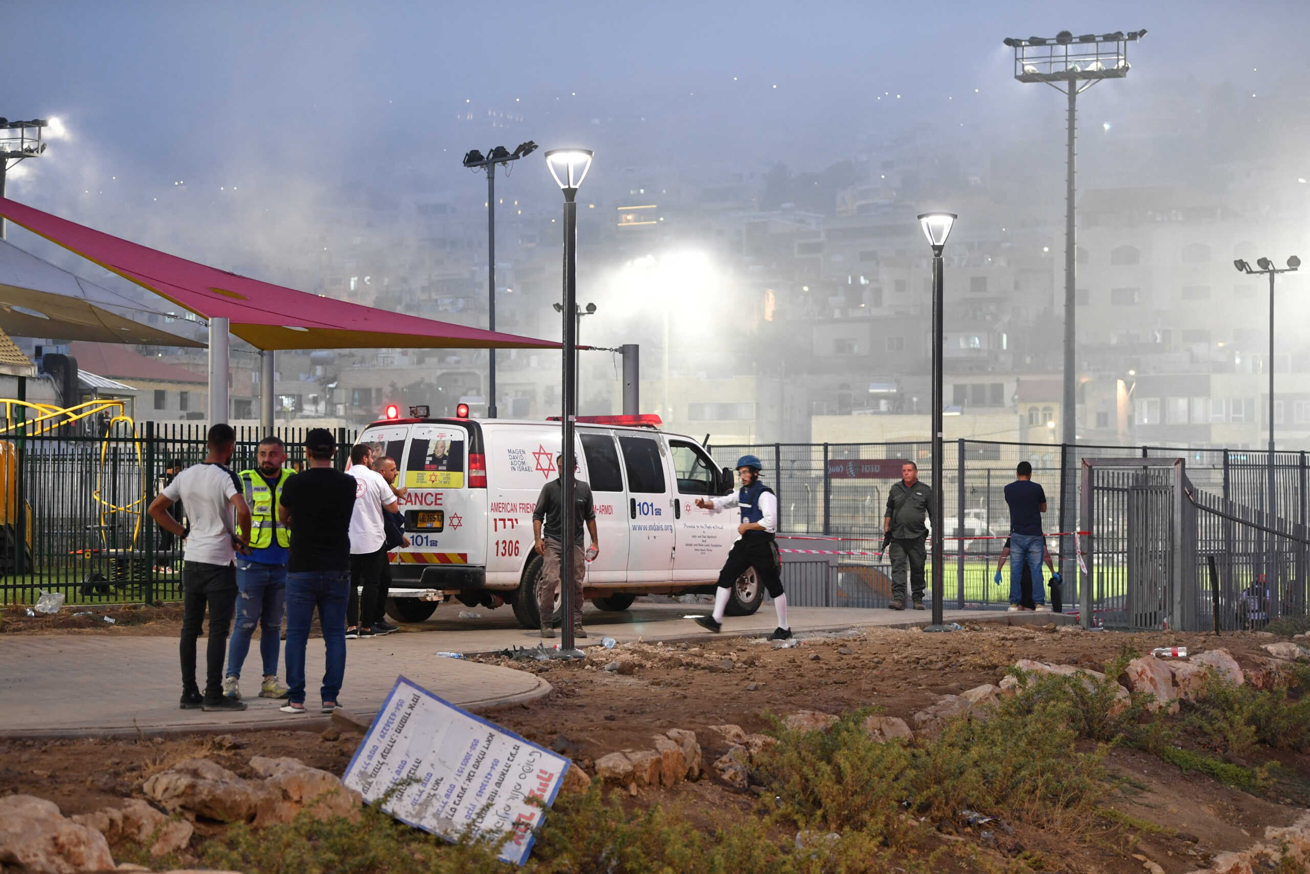 Israeli officials respond after rockets were launched across Lebanon?s border with Israel which, according to Israel?s ambulance services critically injured multiple people at a soccer pitch in Majdal Shams, a Druze village in the Israeli-occupied Golan Heights, July 27 2024. REUTERS