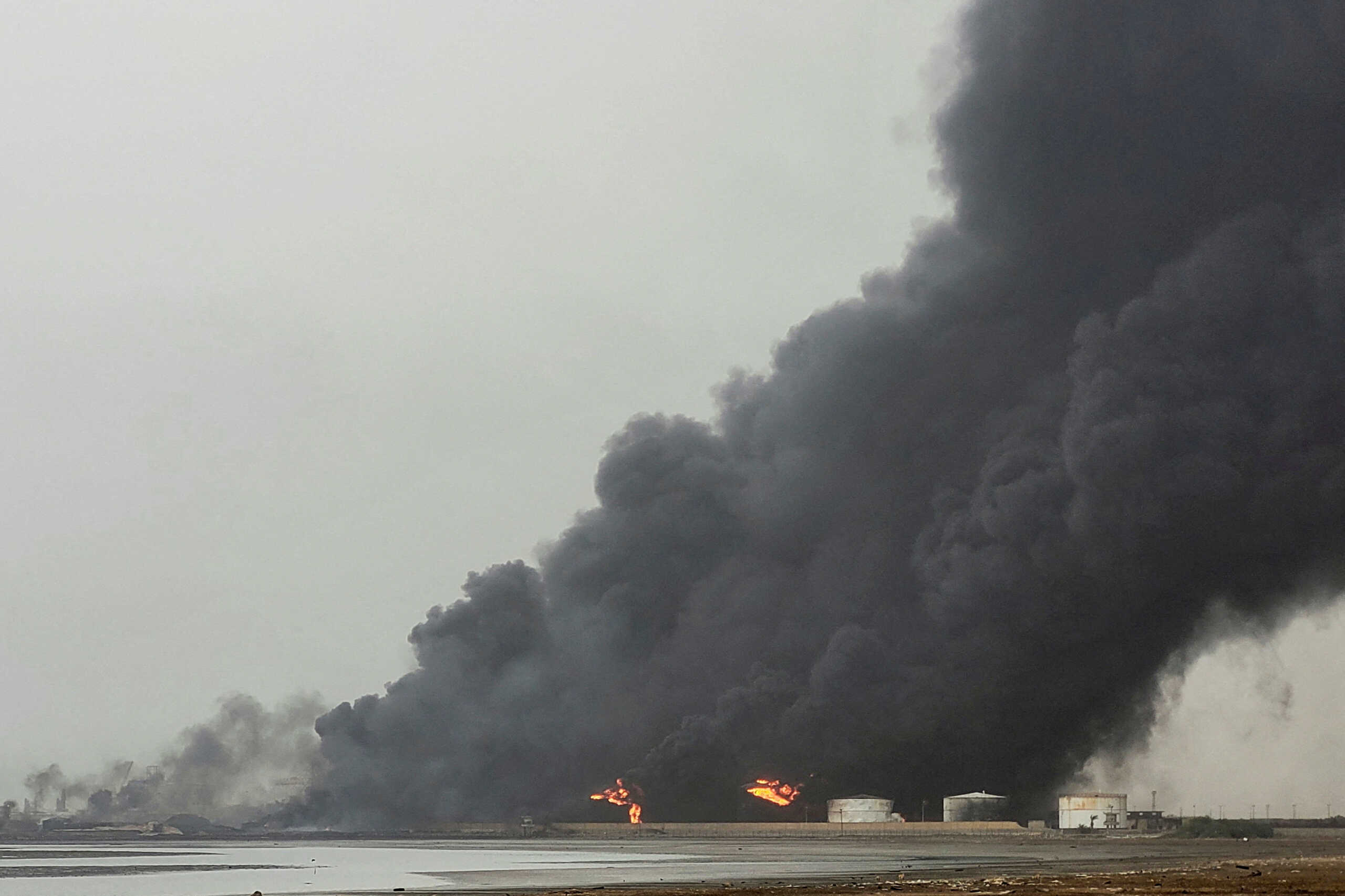 Smoke rises from the site of Israeli air strikes at the port of Hodeidah, in Hodeidah, Yemen July 21, 2024. REUTERS