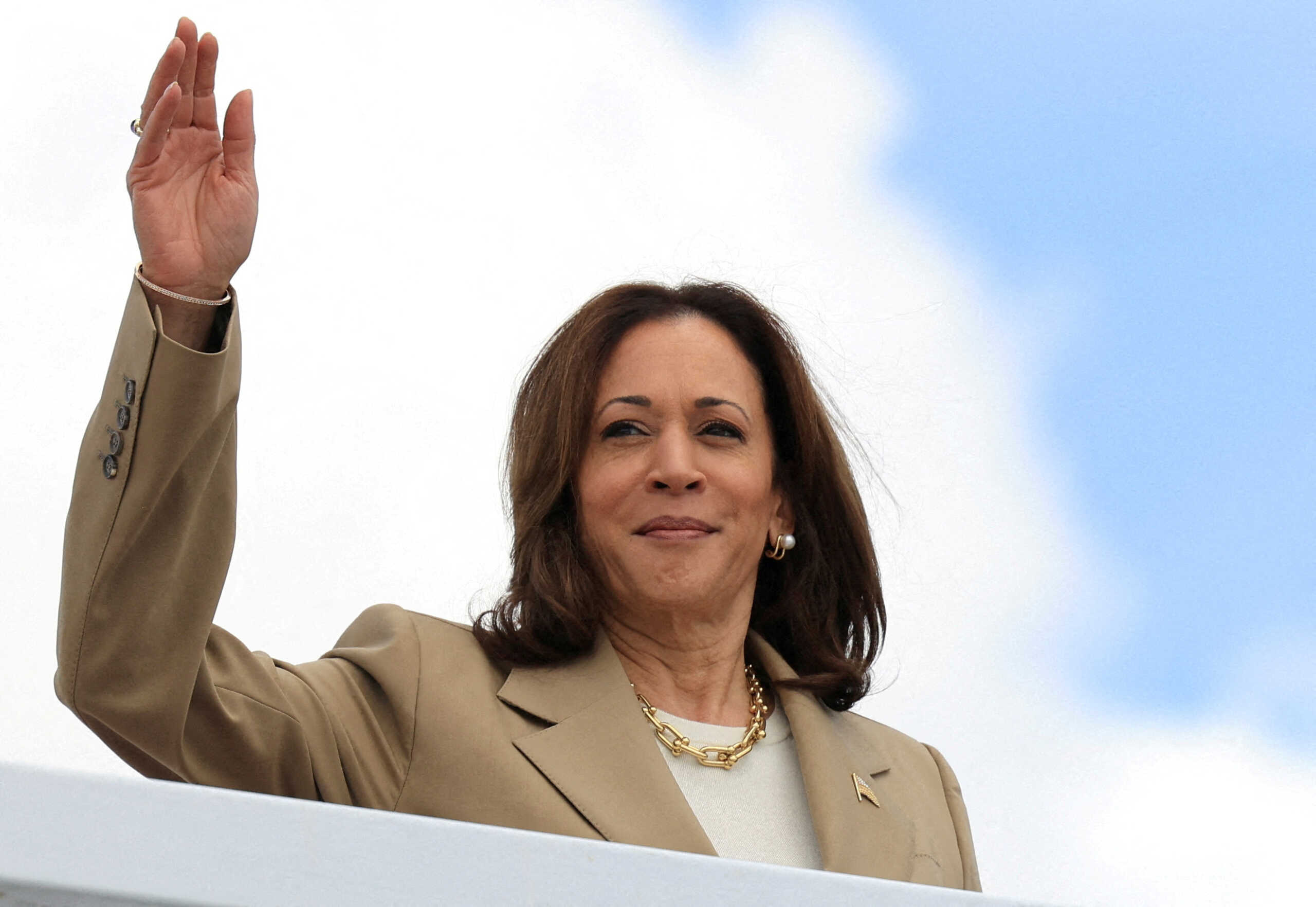FILE PHOTO: U.S. Vice President Kamala Harris waves as she boards Air Force Two to depart on campaign travel to Philadelphia, Pennsylvania, at Joint Base Andrews, Maryland, U.S., July 13, 2024. REUTERS