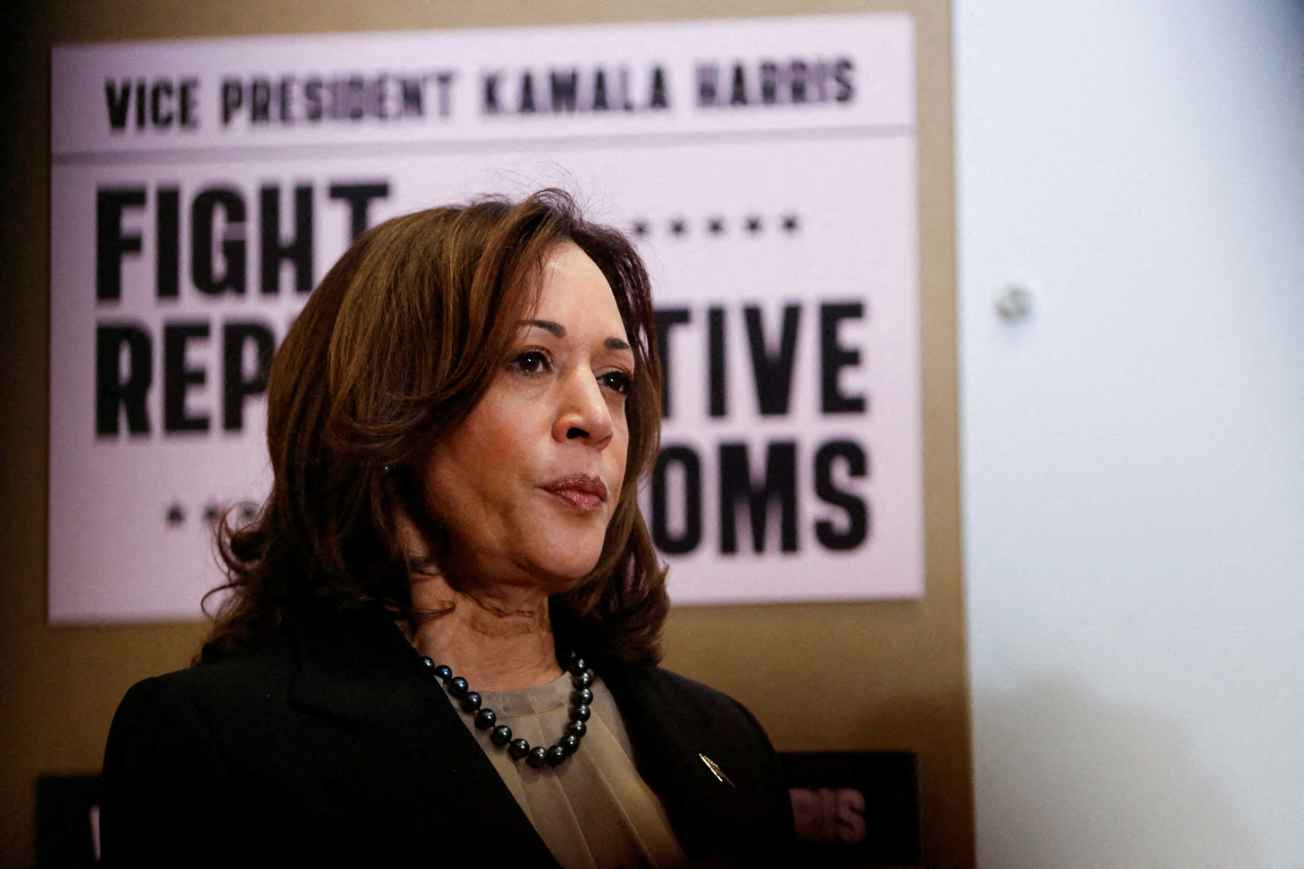 FILE PHOTO: U.S. Vice President Kamala Harris looks on as she visits the St. Paul Health Center, a clinic that performs abortions, in St. Paul, Minnesota, U.S., March 14, 2024. REUTERS