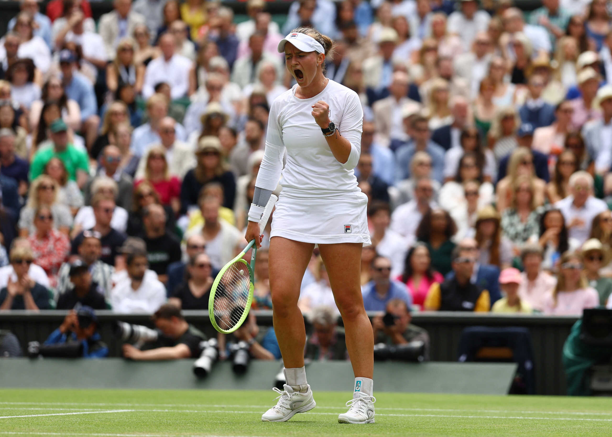 Tennis - Wimbledon - All England Lawn Tennis and Croquet Club, London, Britain - July 13, 2024 Czech Republic's Barbora Krejcikova reacts during the final against Italy's Jasmine Paolini REUTERS