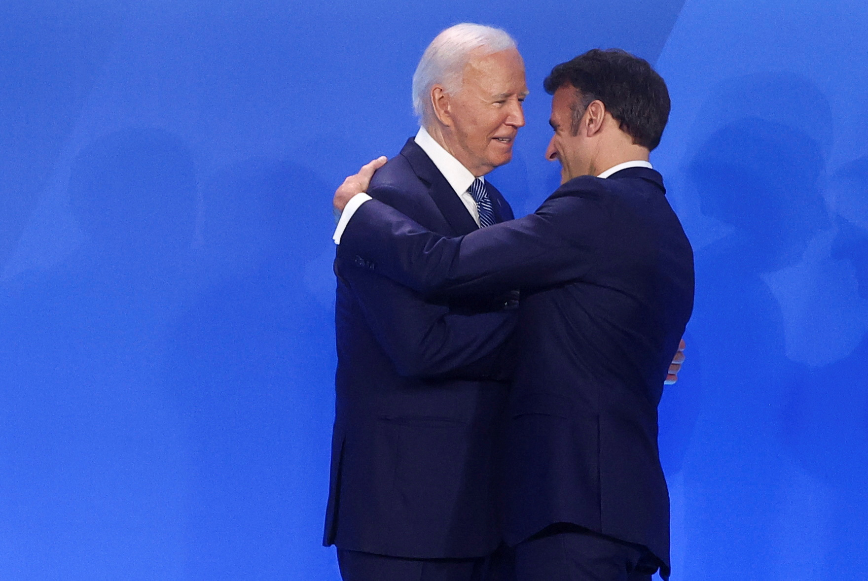 French President Emmanuel Macron is greeted by U.S. President Joe Biden, during NATO's 75th anniversary summit in Washington, U.S., July 10, 2024. REUTERS