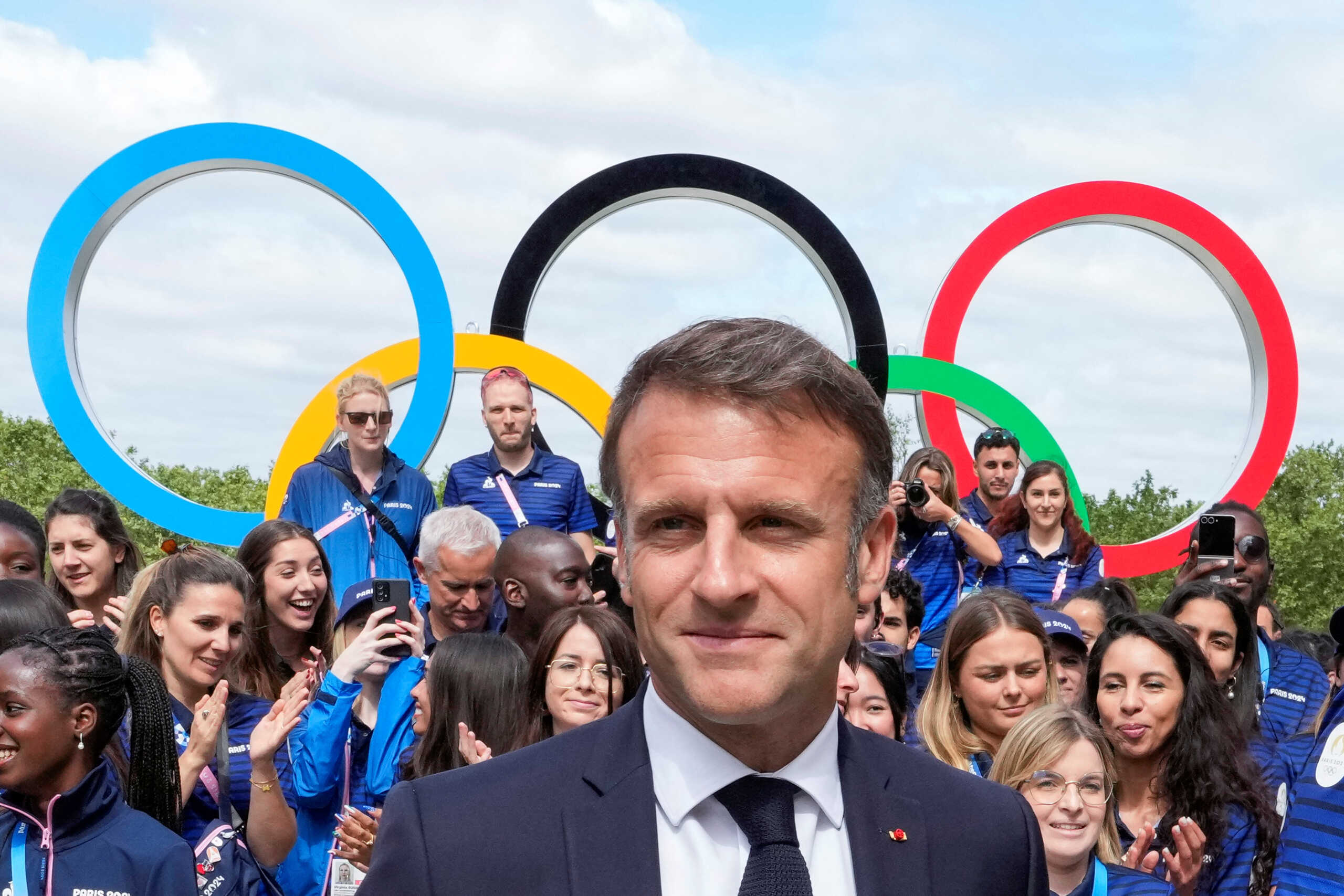 French President Emmanuel Macron meets with French athletes as he visits the Olympic village for the 2024 Summer Olympics, in Paris, France, July 22, 2024.     Michel Euler