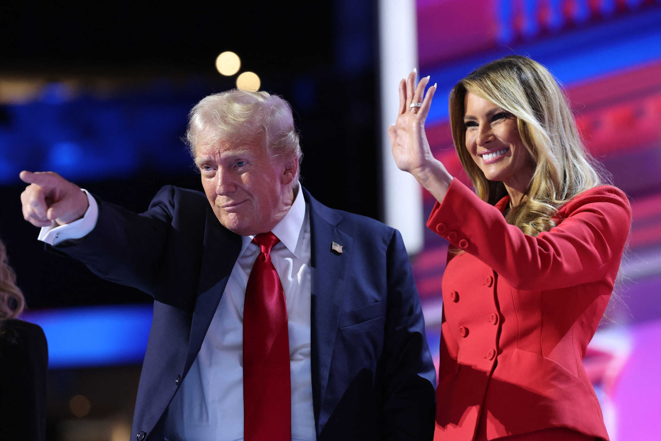 Republican presidential nominee and former U.S. President Donald Trump is joined on stage by his wife Melania after he finished giving his acceptance speech on Day 4 of the Republican National Convention (RNC), at the Fiserv Forum in Milwaukee, Wisconsin, U.S., July 18, 2024. REUTERS