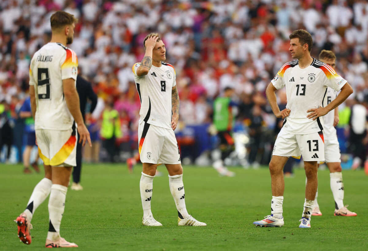 Soccer Football - Euro 2024 - Quarter Final - Spain v Germany - Stuttgart Arena, Stuttgart, Germany - July 5, 2024 Germany's Toni Kroos and Thomas Muller look dejected after the match REUTERS
