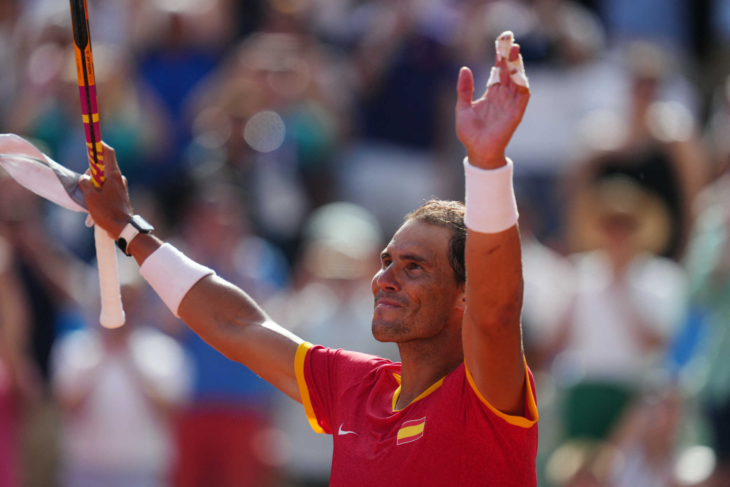 Paris 2024 Olympics - Tennis - Men's Singles First Round - Roland-Garros Stadium, Paris, France - July 28, 2024. Rafael Nadal of Spain celebrates after winning his first round match against Marton Fucsovics of Hungary. REUTERS
