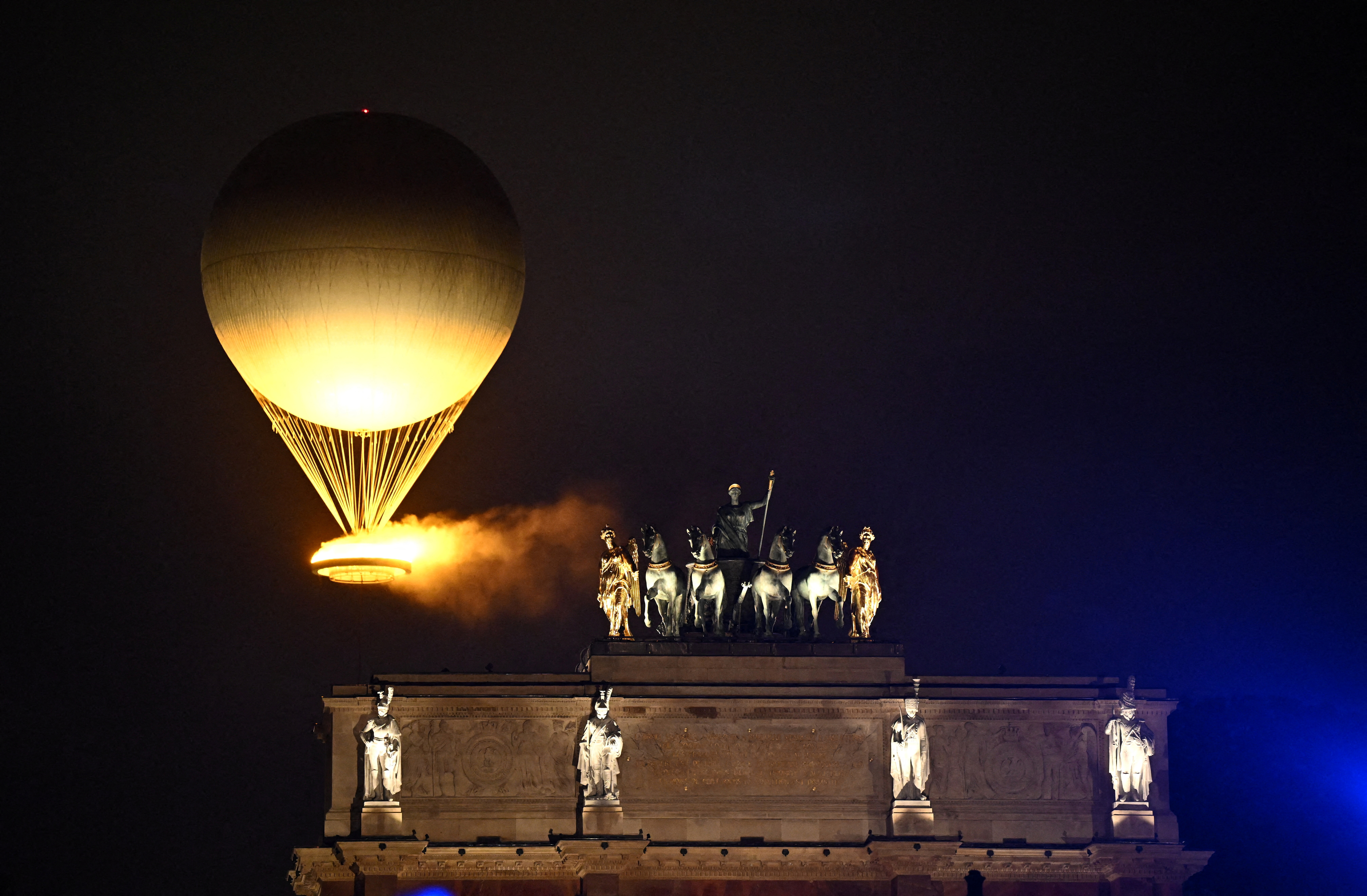 Paris 2024 Olympics - Opening Ceremony - Paris, France - July 26, 2024. A general view of a balloon carrying the Olympic cauldron during the opening ceremony. REUTERS