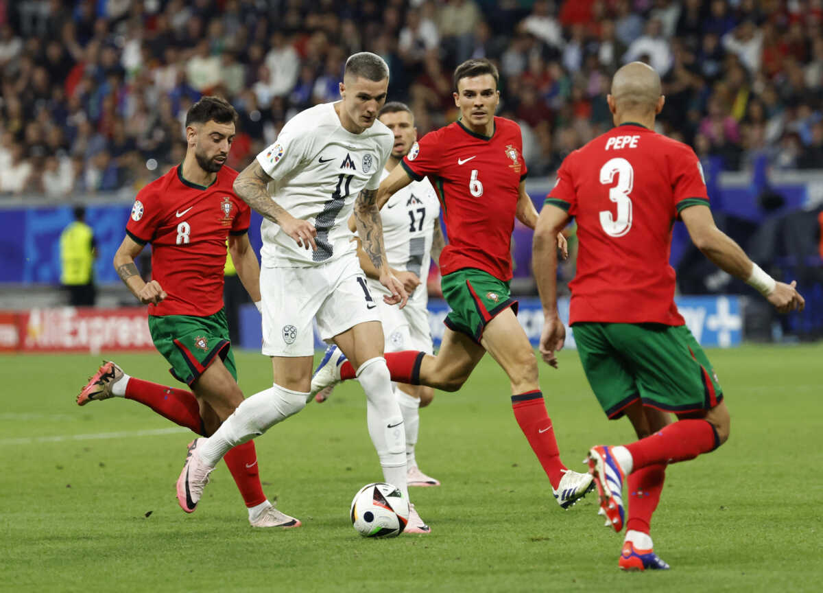 Soccer Football - Euro 2024 - Round of 16 - Portugal v Slovenia - Frankfurt Arena, Frankfurt, Germany - July 1, 2024  Slovenia's Benjamin Sesko in action with Portugal's Bruno Fernandes, Joao Palhinha and Pepe REUTERS