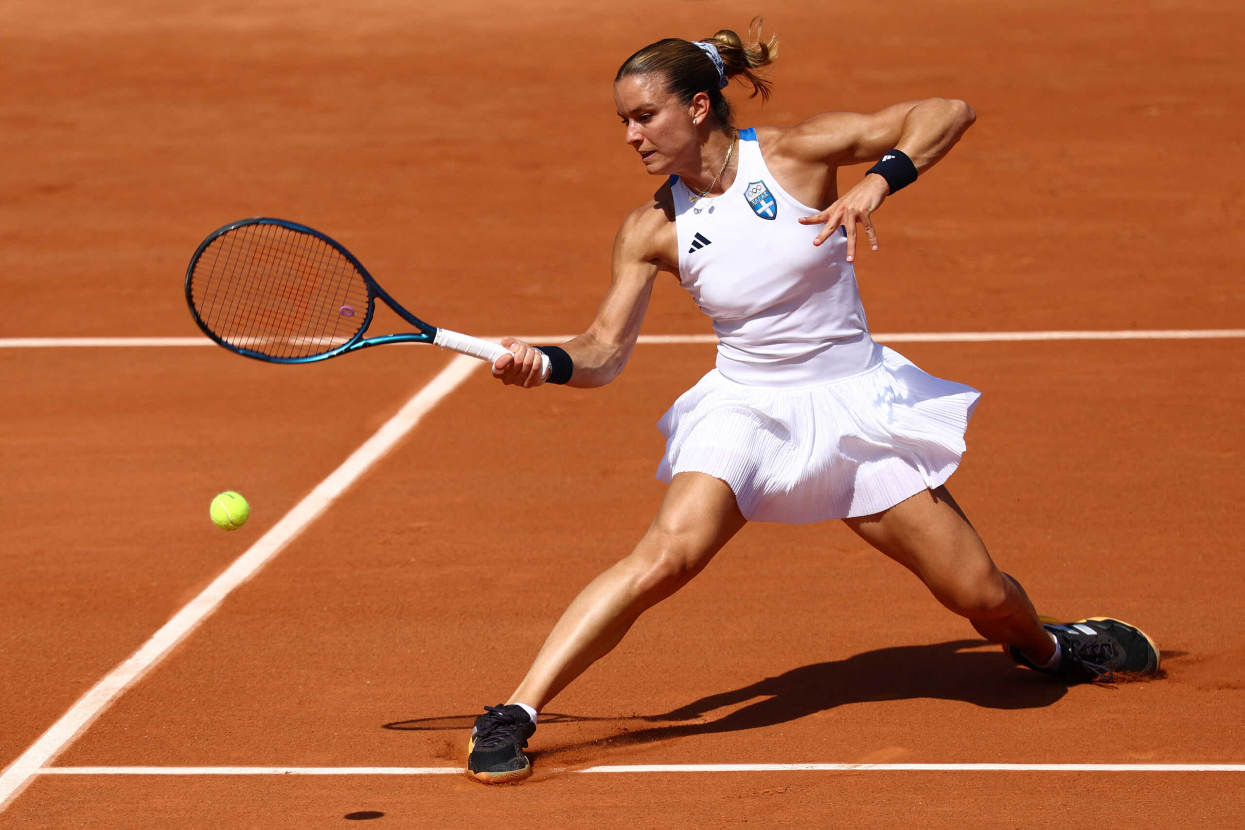 Paris 2024 Olympics - Tennis - Women's Singles Second Round - Roland-Garros Stadium, Paris, France - July 29, 2024. Maria Sakkari of Greece in action during her match against Yue Yuan of China. REUTERS