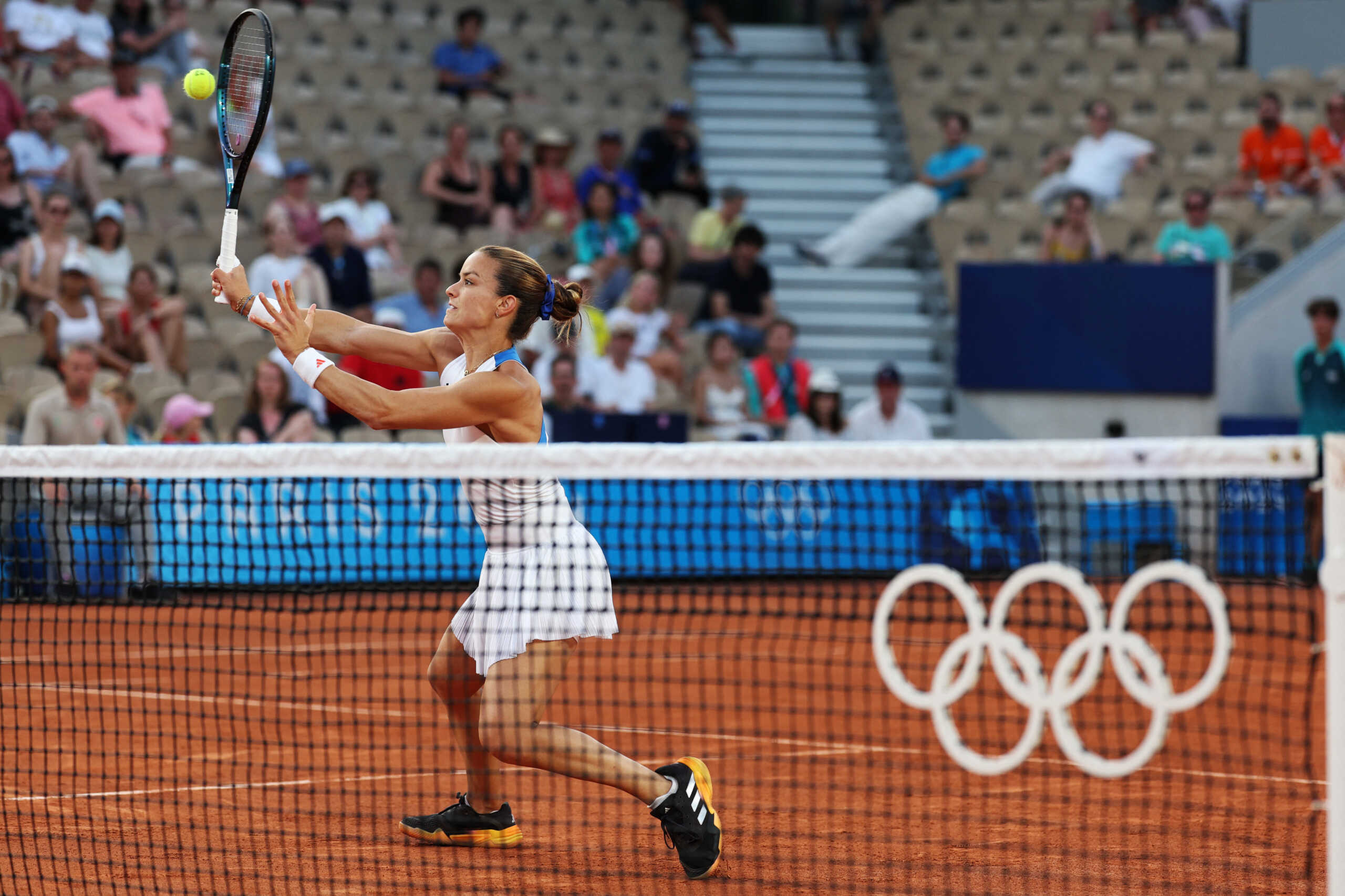 Paris 2024 Olympics - Tennis - Mixed Doubles First Round - Roland-Garros Stadium, Paris, France - July 29, 2024. Maria Sakkari of Greece in action during her match with Stefanos Tsitsipas of Greece against Demi Schuurs of Netherlands and Wesley Koolhof of Netherlands. REUTERS