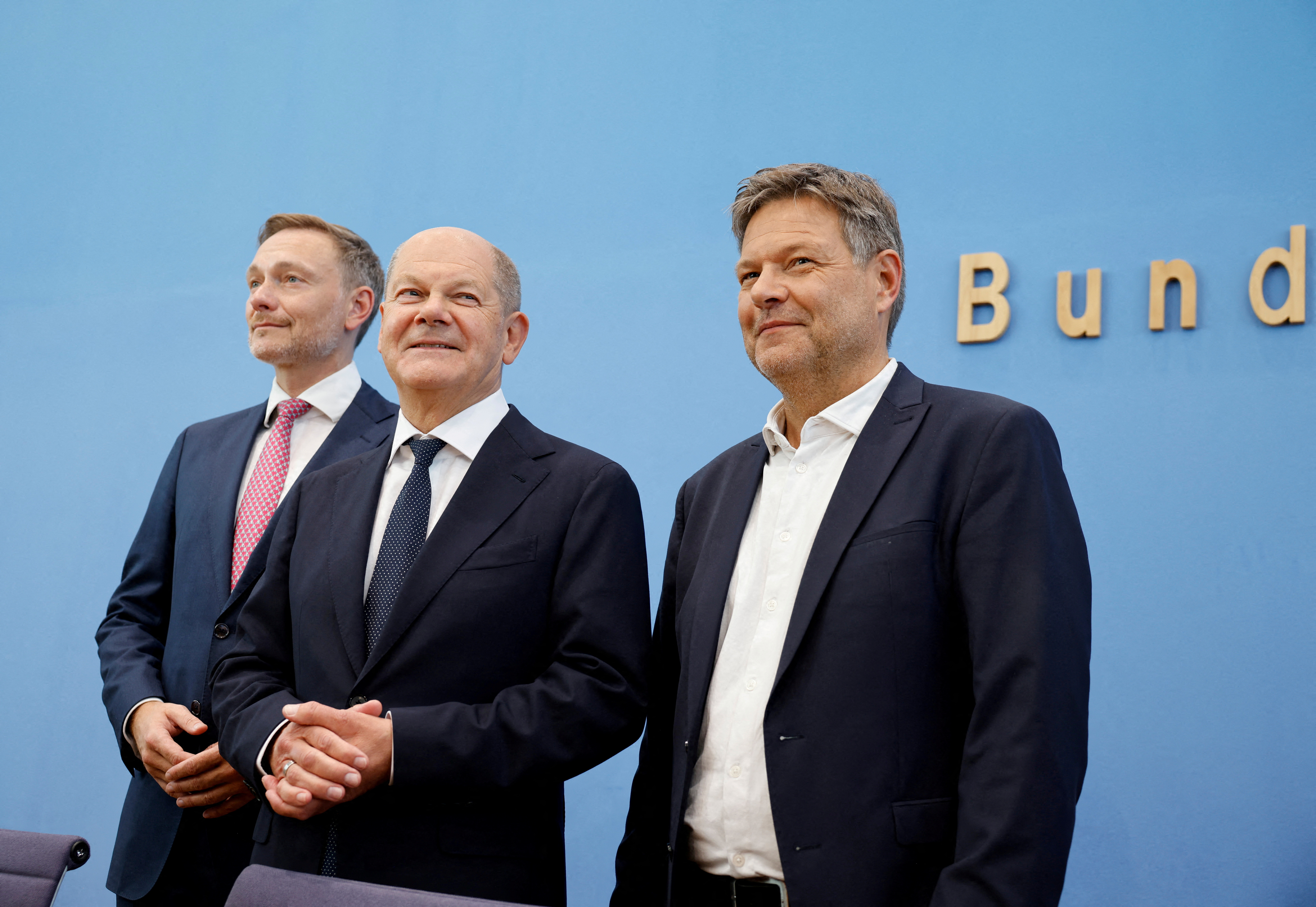 FILE PHOTO: German Chancellor Olaf Scholz of the Social Democratic Party SPD, his coalition partners Finance Minister Christian Lindner of the Liberal Party FDP, and Economy Minister Robert Habeck of the Greens arrive for a joint news conference after agreeing on the 2025 budget in Berlin, Germany, July 5, 2024.    REUTERS