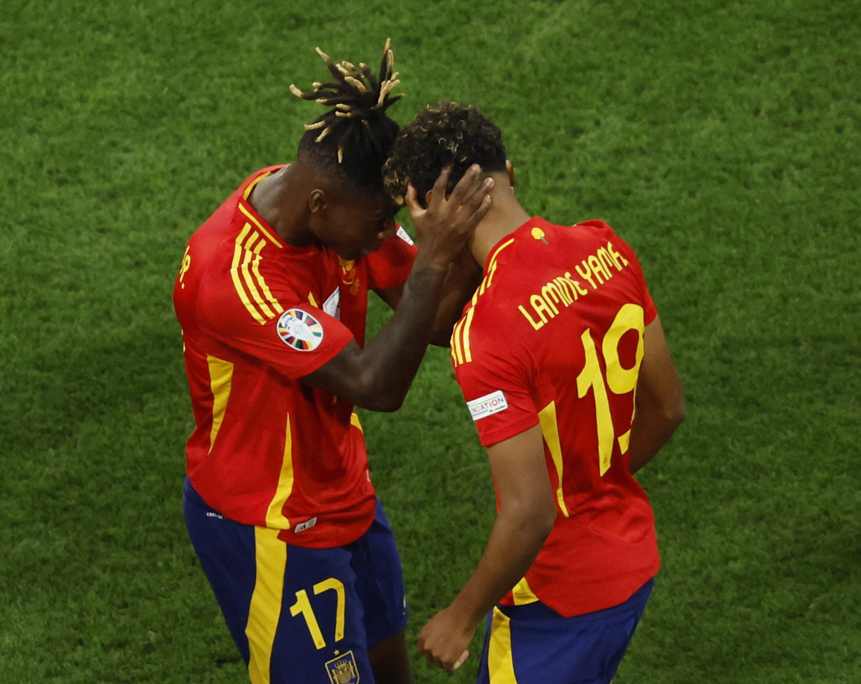 Soccer Football - Euro 2024 - Semi Final - Spain v France - Munich Football Arena, Munich, Germany - July 9, 2024 Spain's Lamine Yamal celebrates scoring their first goal with Nico Williams REUTERS