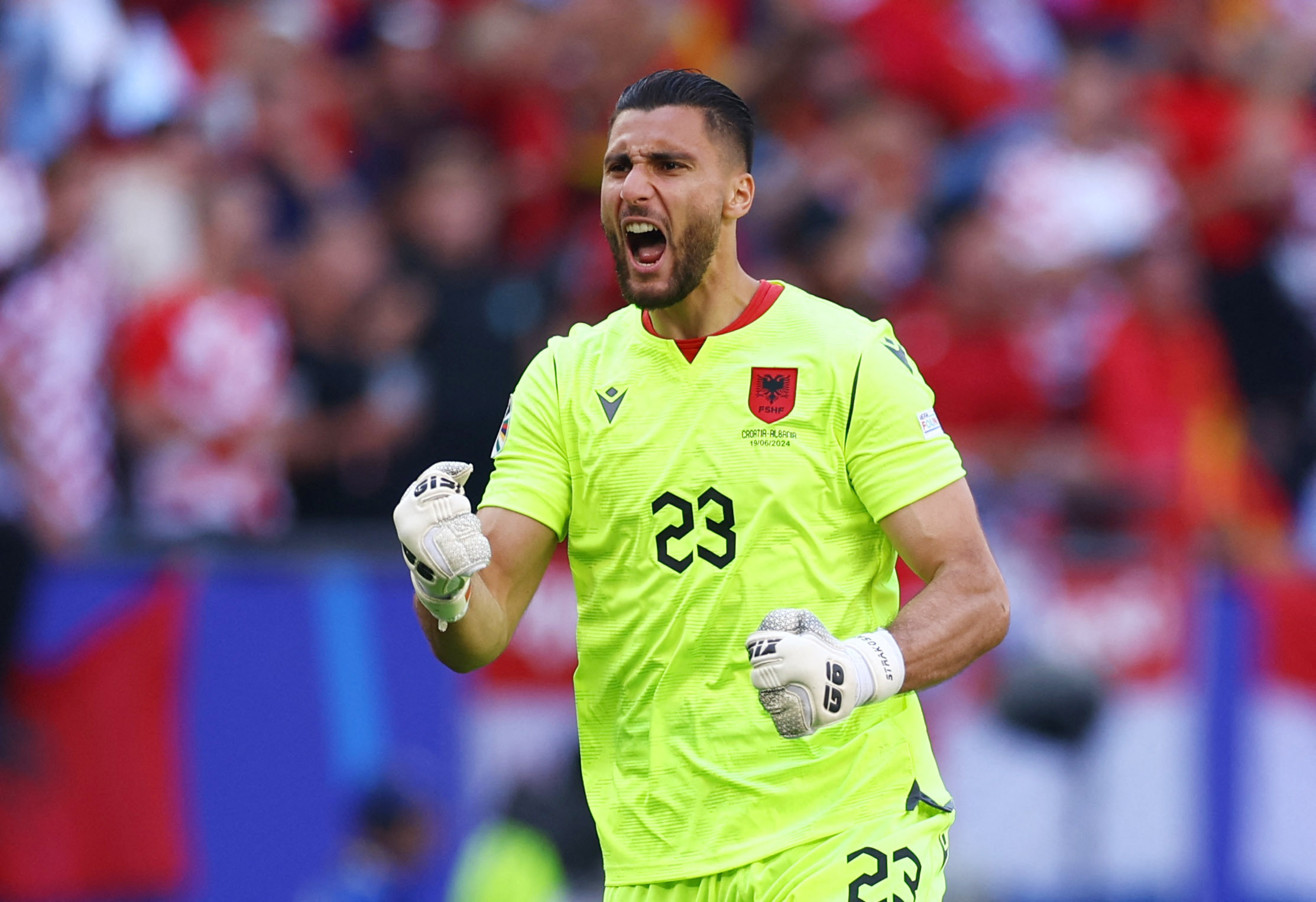 Soccer Football - Euro 2024 - Group B - Croatia v Albania - Hamburg Volksparkstadion, Hamburg, Germany - June 19, 2024 Albania's Thomas Strakosha celebrates after Klaus Gjasula scores their second goal REUTERS