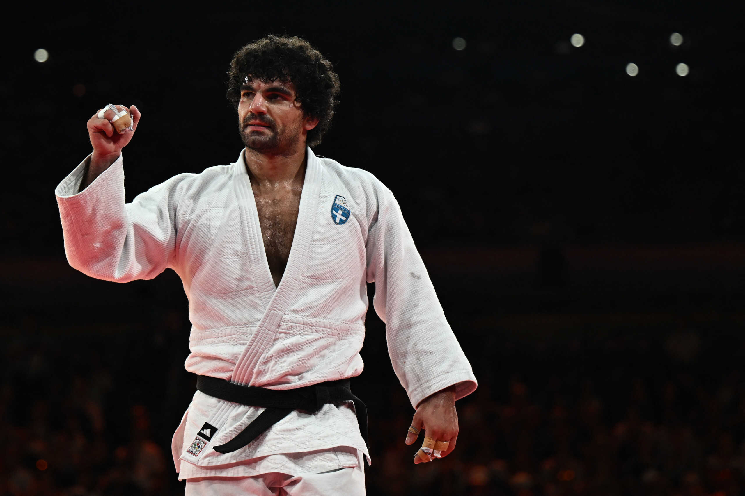 Paris 2024 Olympics - Judo - Men -90 kg Contest for Bronze Medal B - Champ de Mars Arena, Paris, France - July 31, 2024.  Theodoros Tselidis of Greece reacts after winning his bout against Tristani Mosakhlishvili of Spain. REUTERS