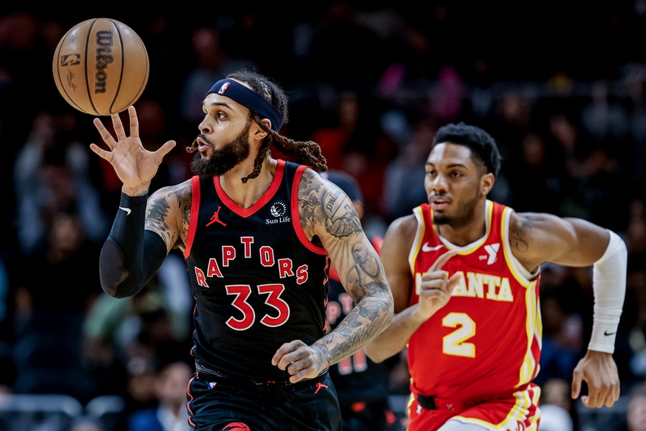 epa11111755 Toronto Raptors guard Gary Trent Jr. (L) steals the ball from Atlanta Hawks guard Trent Forrest (R) during the first half of the NBA basketball game between the Toronto Raptors and the Atlanta Hawks in Atlanta, Georgia, USA, 28 January 2024.  EPA