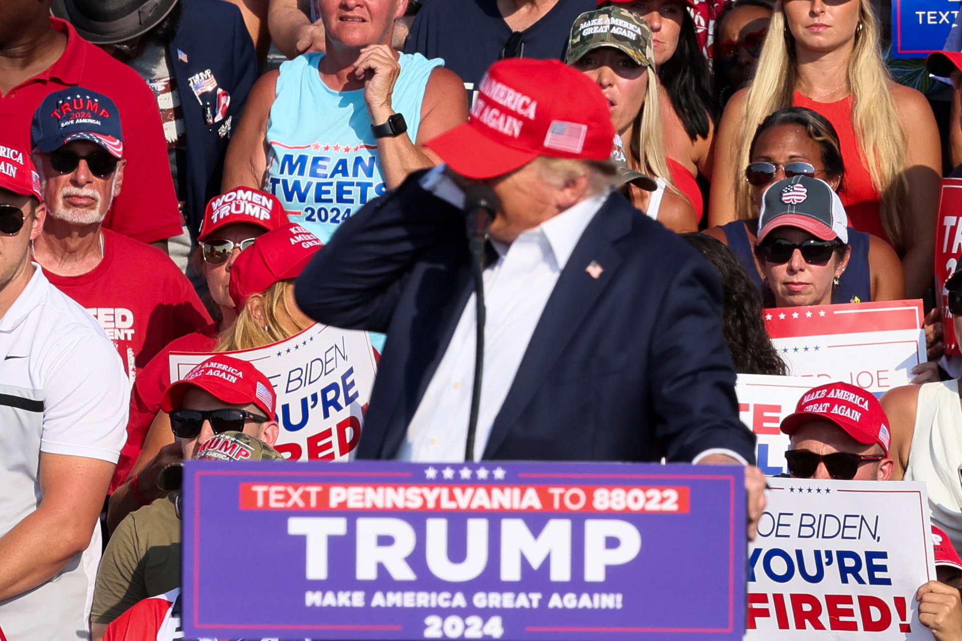Republican presidential candidate and former U.S. President Donald Trump reacts as multiple shots rang out during a campaign rally at the Butler Farm Show in Butler, Pennsylvania, U.S., July 13, 2024. REUTERS