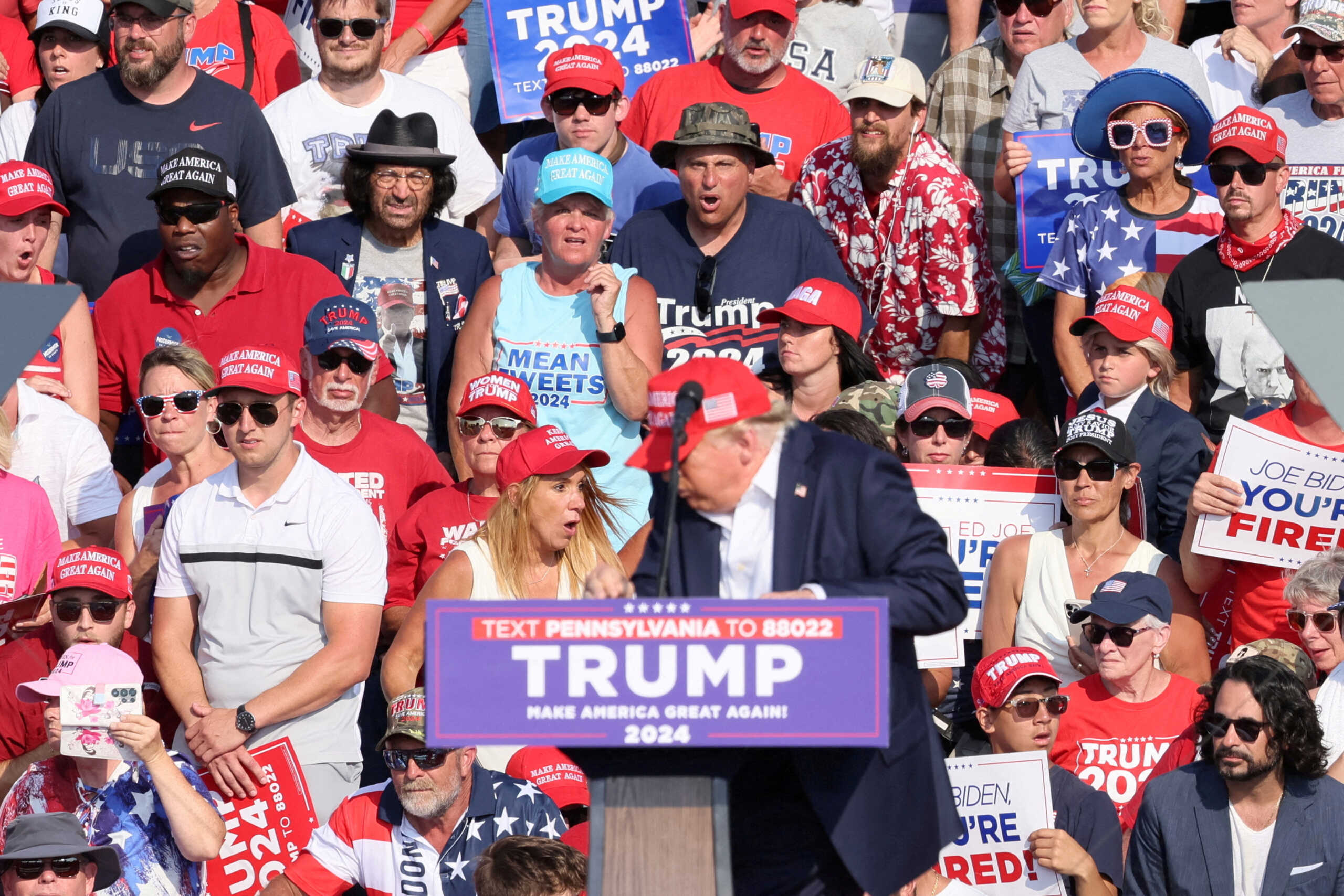 Republican presidential candidate and former U.S. President Donald Trump reacts after gunfire rang out during a campaign rally at the Butler Farm Show in Butler, Pennsylvania, U.S., July 13, 2024. REUTERS