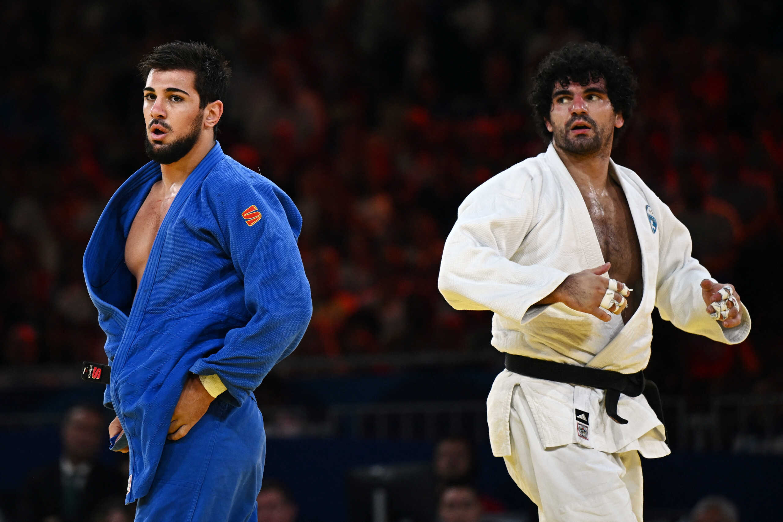 Paris 2024 Olympics - Judo - Men -90 kg Repechage contest - Champ de Mars Arena, Paris, France - July 31, 2024.  Theodoros Tselidis of Greece and Aram Grigorian of United Arab Emirates during their bout. REUTERS