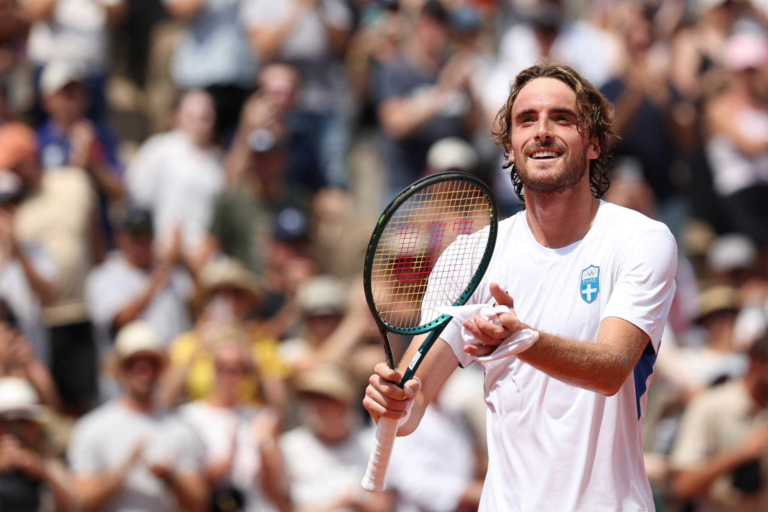 Paris 2024 Olympics - Tennis - Men's Singles Third Round - Roland-Garros Stadium, Paris, France - July 31, 2024. Stefanos Tsitsipas of Greece celebrates after winning his match against Sebastian Baez of Argentina. REUTERS