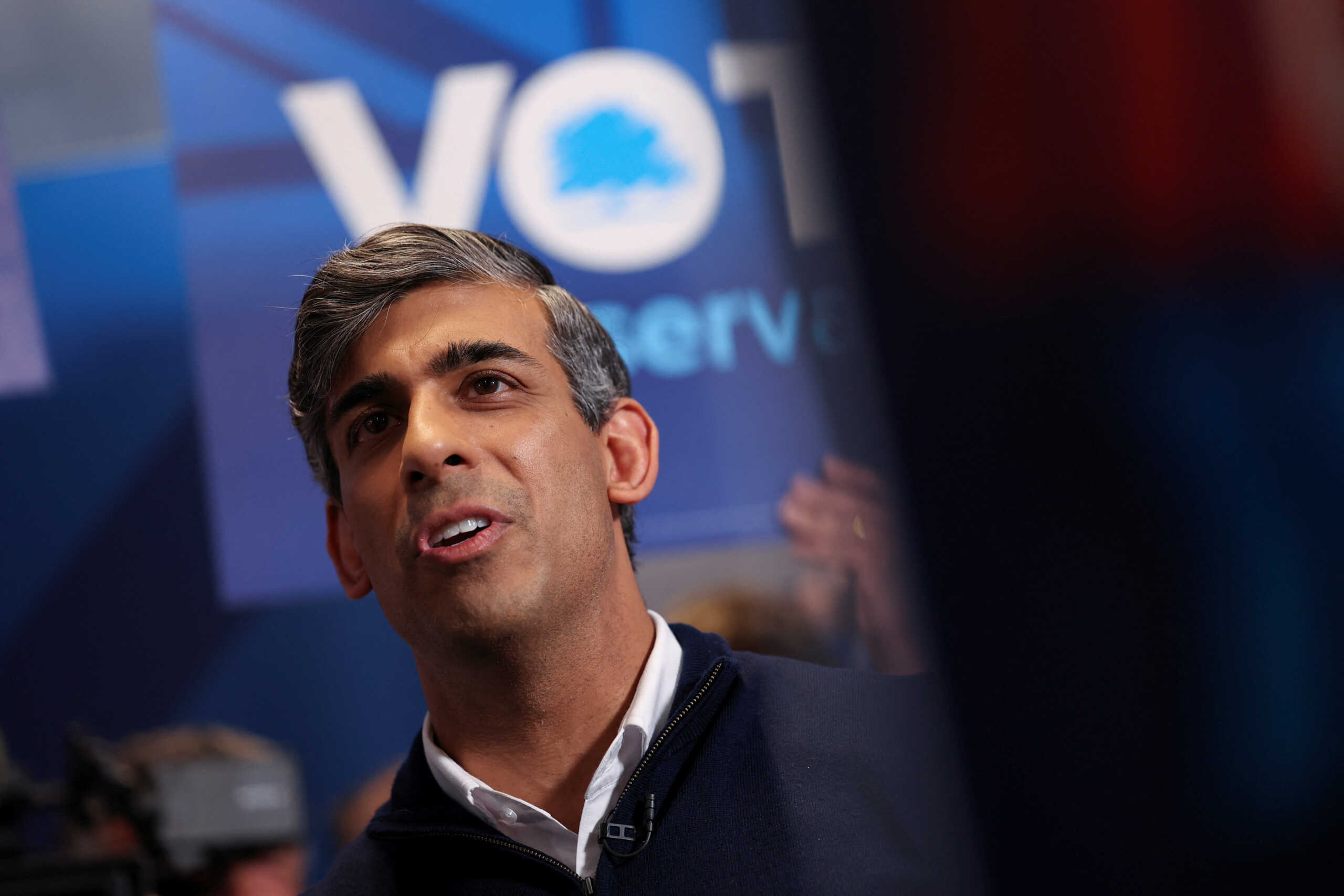 British Prime Minister Rishi Sunak reacts during his final rally at Romsey Rugby Football Club as part of a Conservative general election campaign event in Hampshire, Britain July 3, 2024. REUTERS