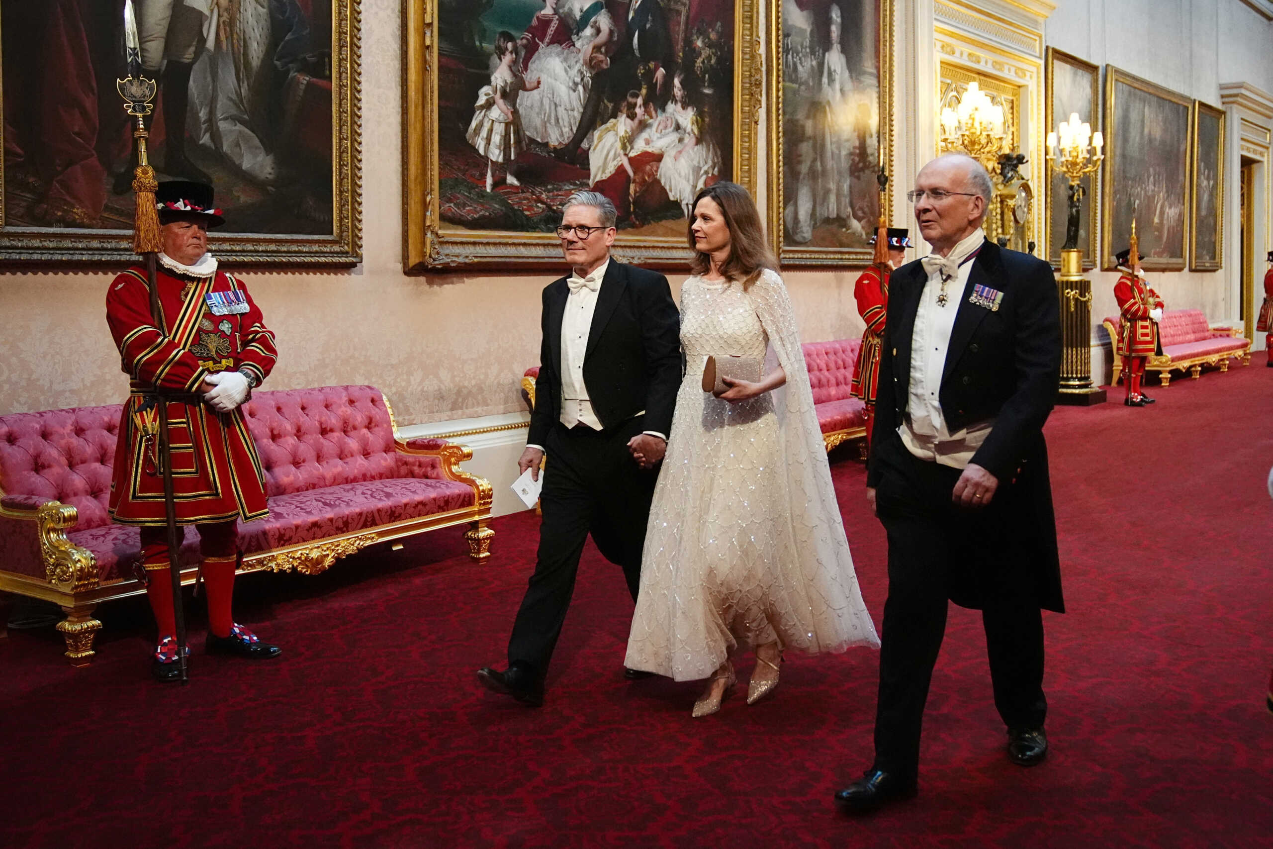 Britain's Labour leader Sir Keir Starmer with his wife Victoria make their way along the East Gallery to attend the State Banquet for Emperor Naruhito and his wife Empress Masako of Japan at Buckingham Palace, London, Britain  June 25, 2024. Aaron Chown