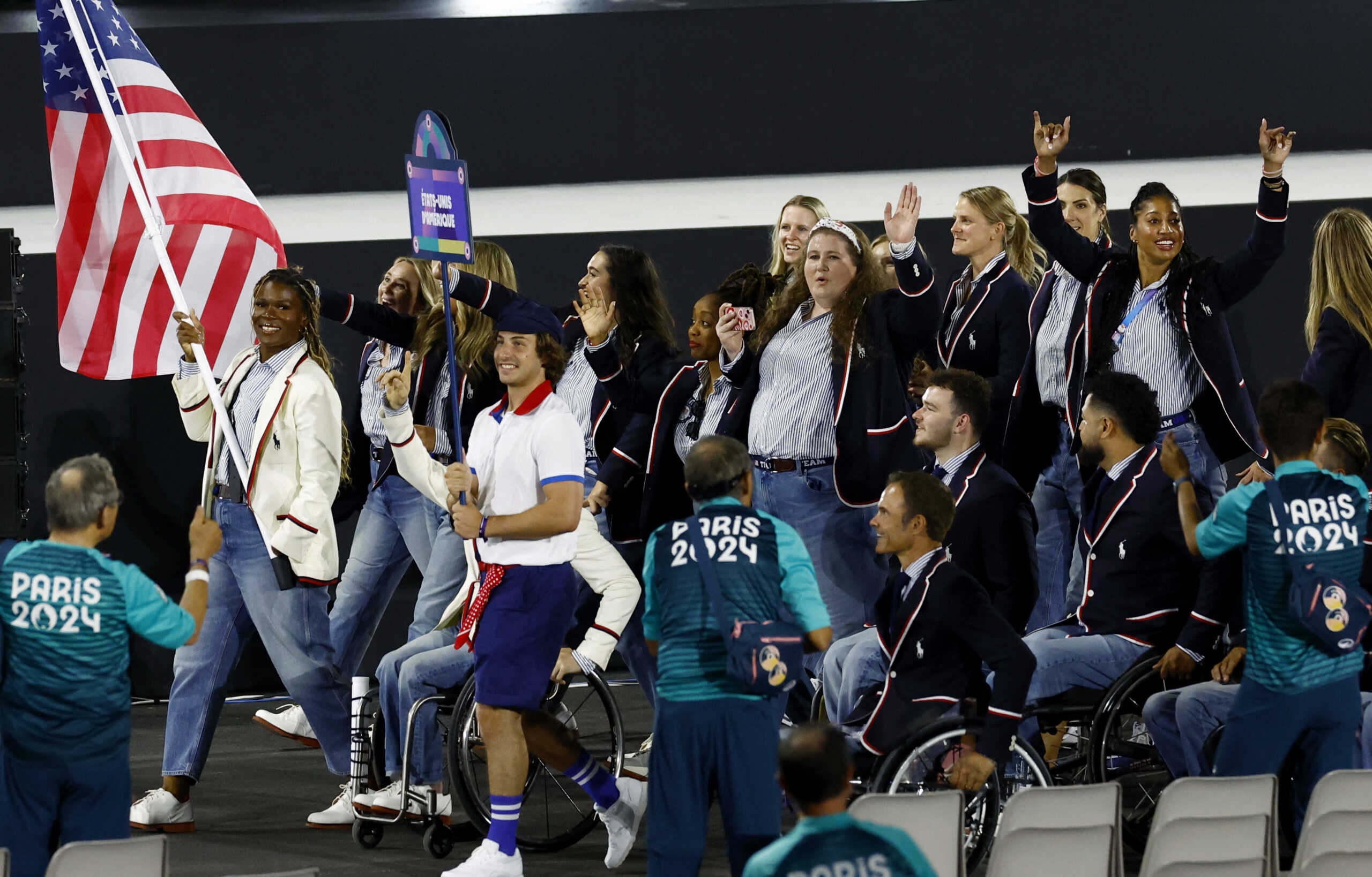 Paris 2024 Paralympics - Opening Ceremony - Paris, France - August 28, 2024 Flag bearer Nicky Nieves of United States and athletes during the opening ceremony REUTERS