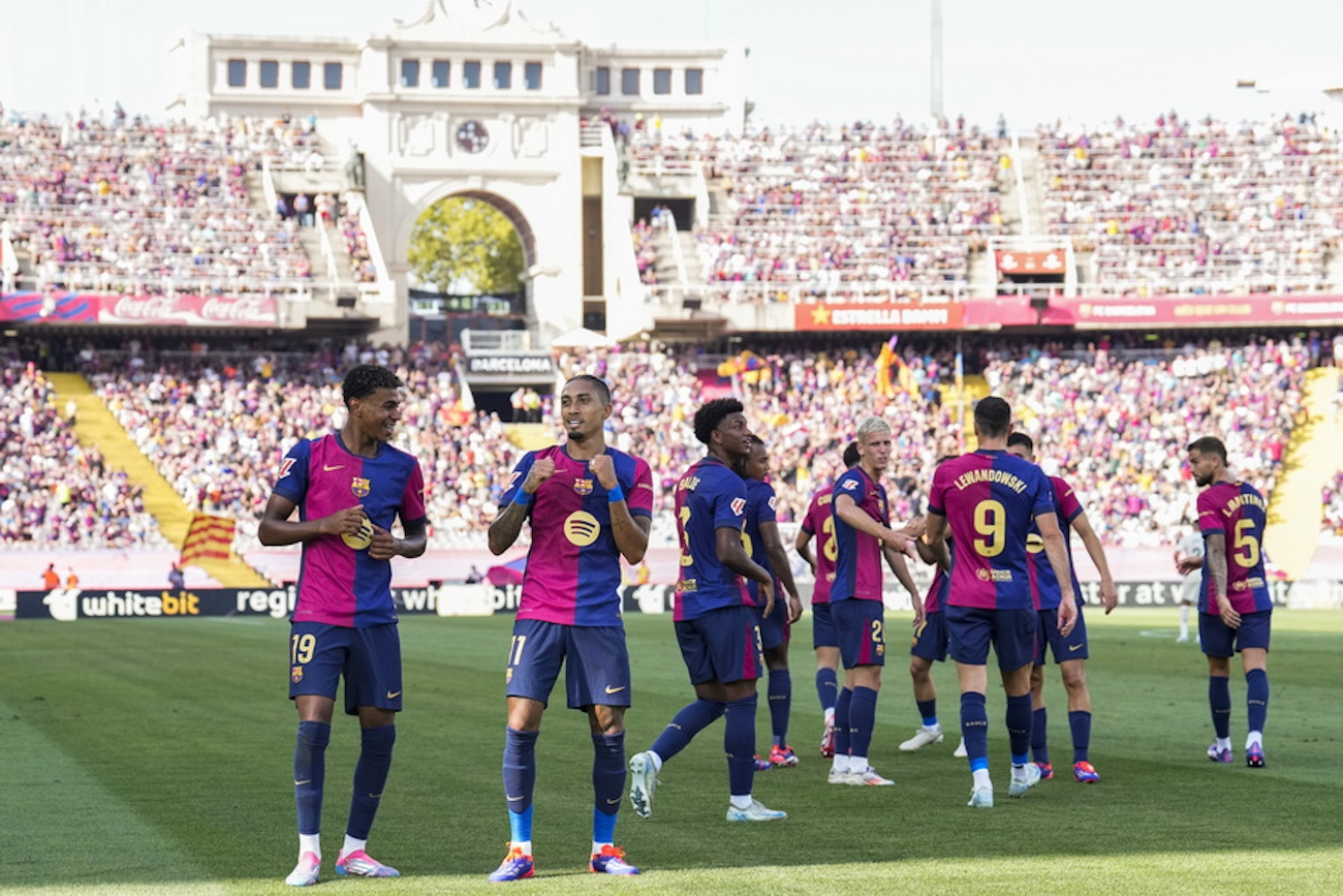 epa11575681 FC Barcelona's Raphinha (2L) celebrates after scoring during a Spanish LaLiga EA Sports soccer match between FC Barcelona and Real Valladolid at Lluis Companys Olympic stadium in Barcelona, Spain, 31 August 2024.  EPA
