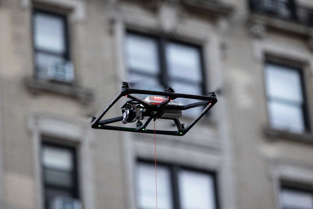 New York Police Department (NYPD) law enforcement officials surveil protesters gathered at a main entrance in front of Columbia University, from inside a vehicle using a drone, amid the ongoing conflict in Gaza between Israel and Hamas, in New York City, U.S., August 25, 2024, REUTERS